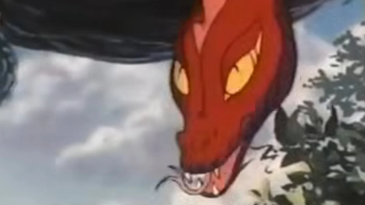 A red snake thing looks all sultry-like into the camera. It has yellow eyes and a forked tongue.