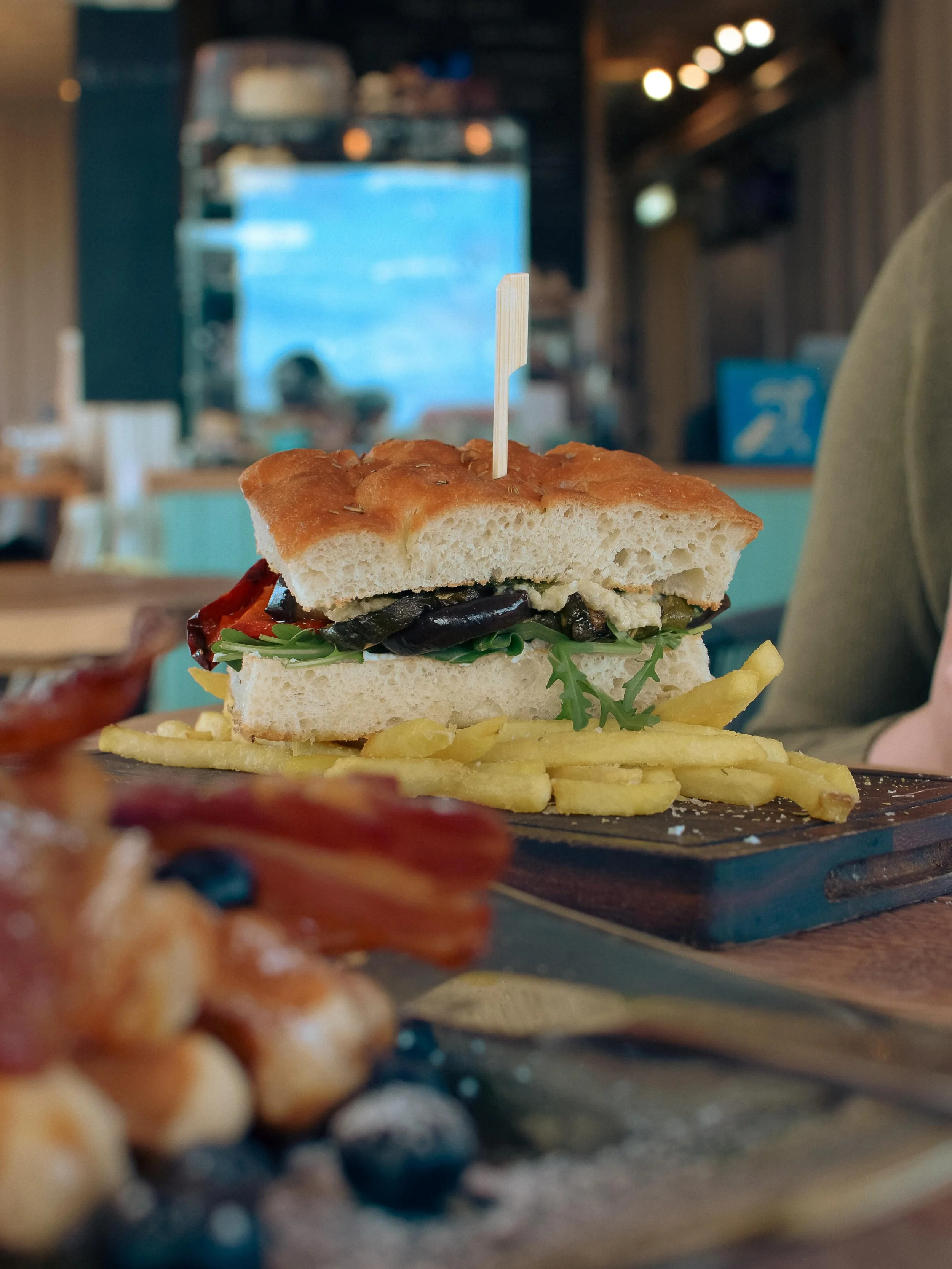 Spring menu spotlight - Roasted Mediterranean Vegetable Sandwich 

Farm baked focaccia, roasted Mediterranean vegetables, lemon and black pepper ricotta, basil, garlic, almond and parmesan pesto, artichoke and lemon tapenade, fresh rocket and is serv