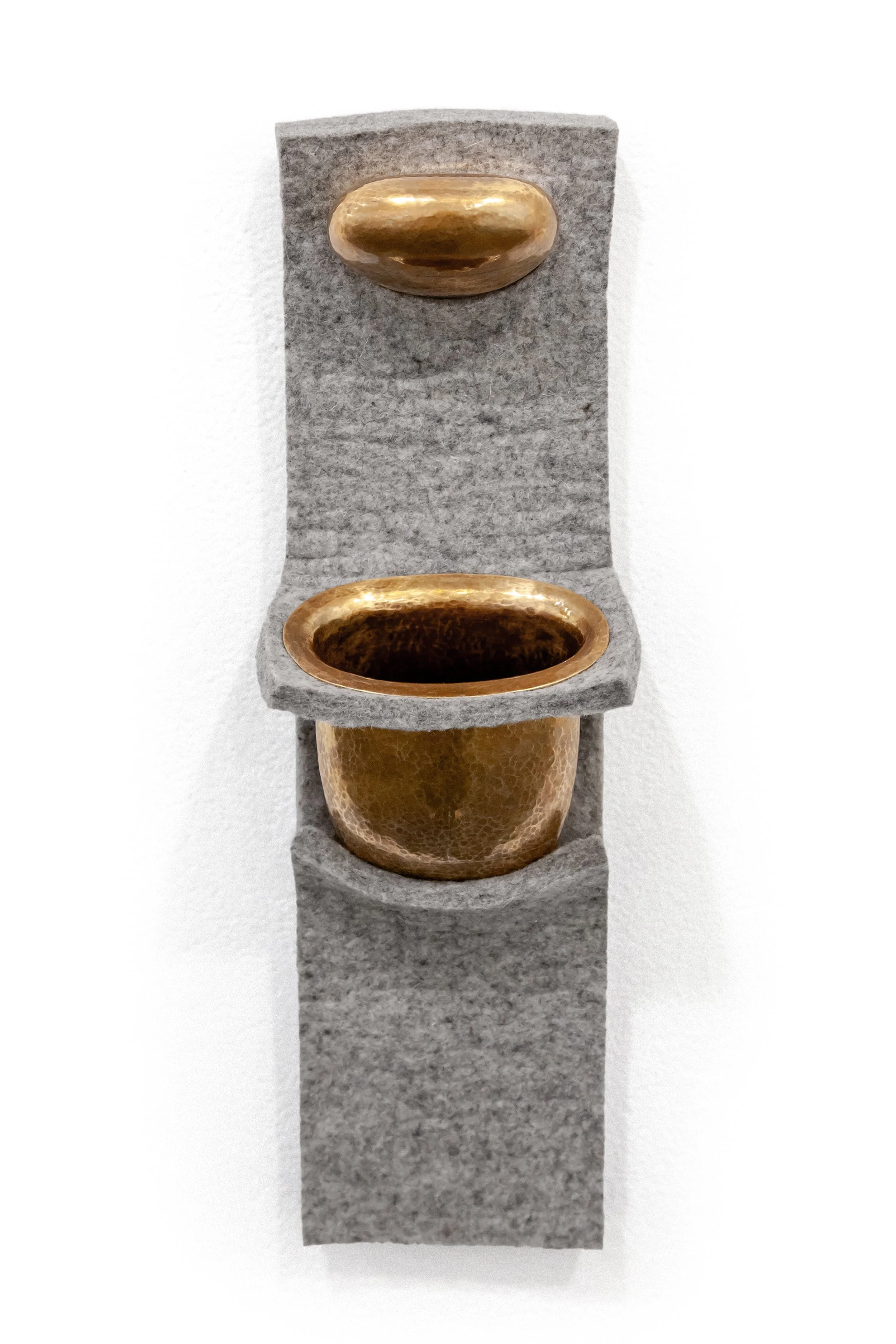 Felt Mount, 2024. Bronze, industrial felt. 17 x 5 x 4 in.
