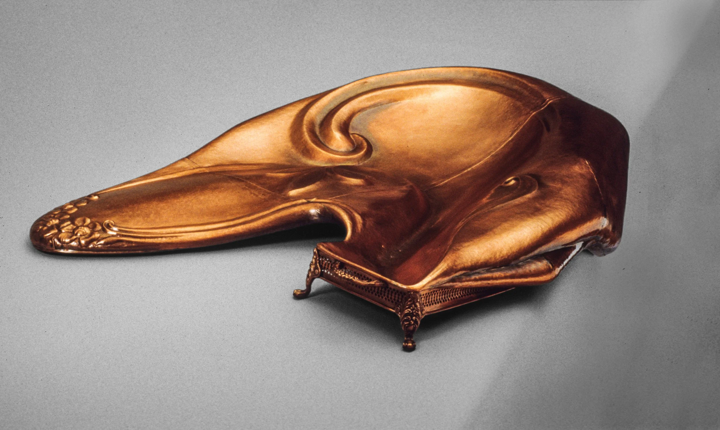 Chafing Dish, 2002. Chased and fabricated copper, found object fragment. 9 x 44 x 33 in.