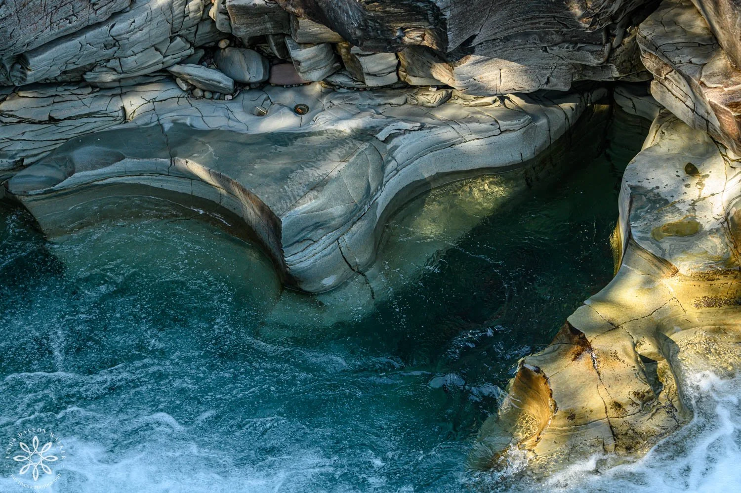 Clear glacier water with rock textures, Glacier National Park