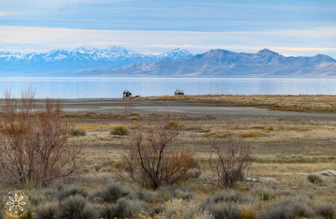 Two airboats docked on shore of Fremont Island
