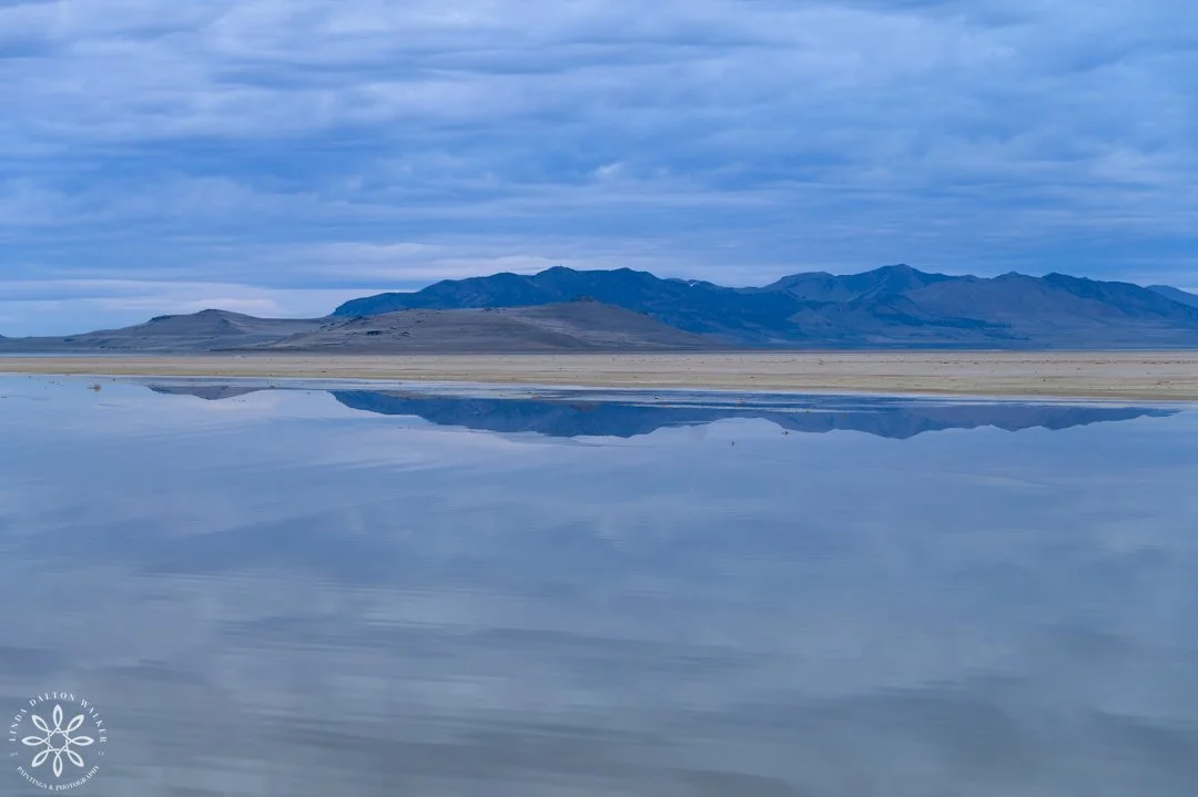 Fremont Island with sandbar in front.