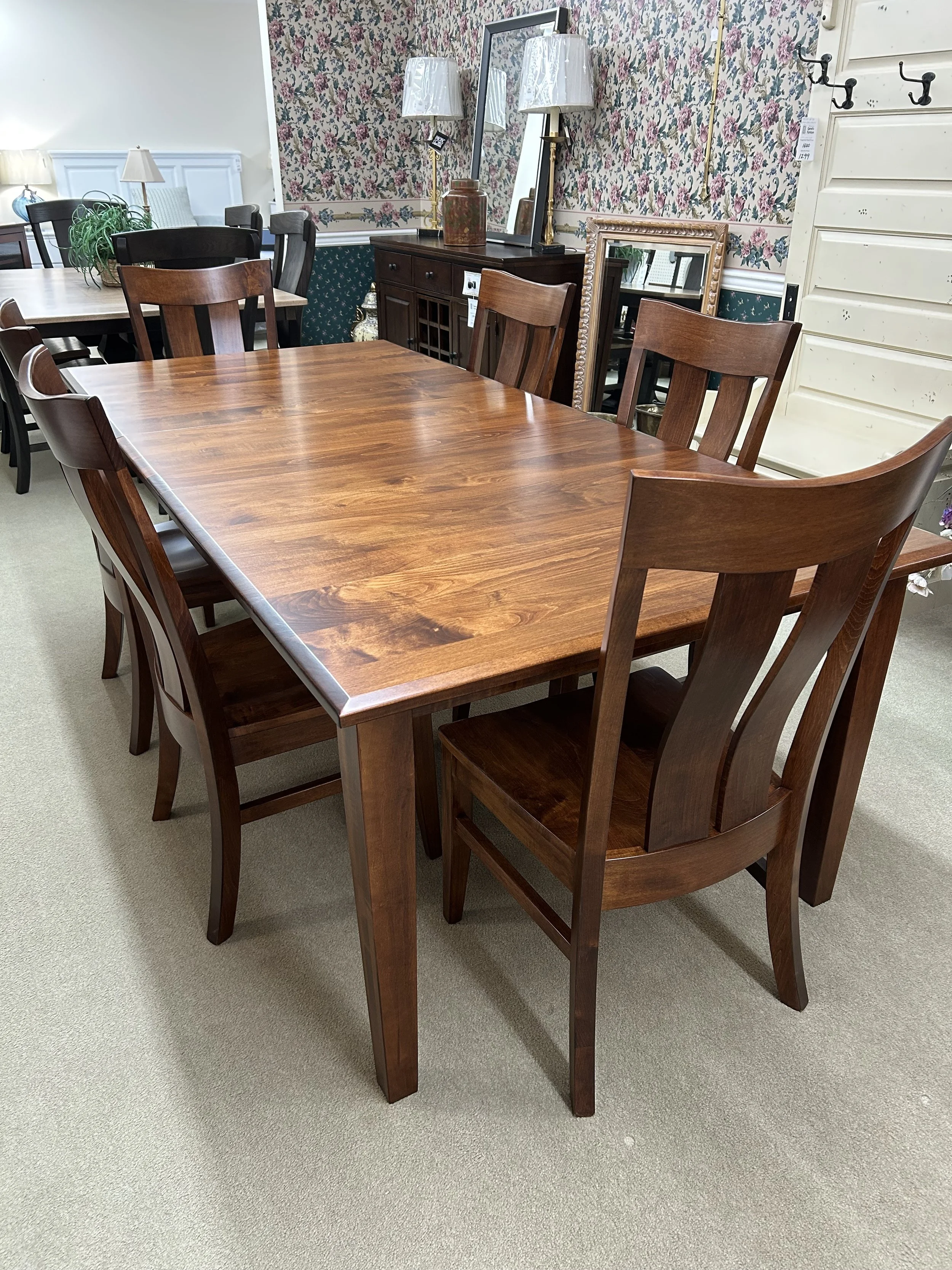 Amish Essentials 42” x 72” table with one 18” leaf in Michael’s stain on solid Maple. Comes with six Florence side chairs.  Amish made in Indiana.