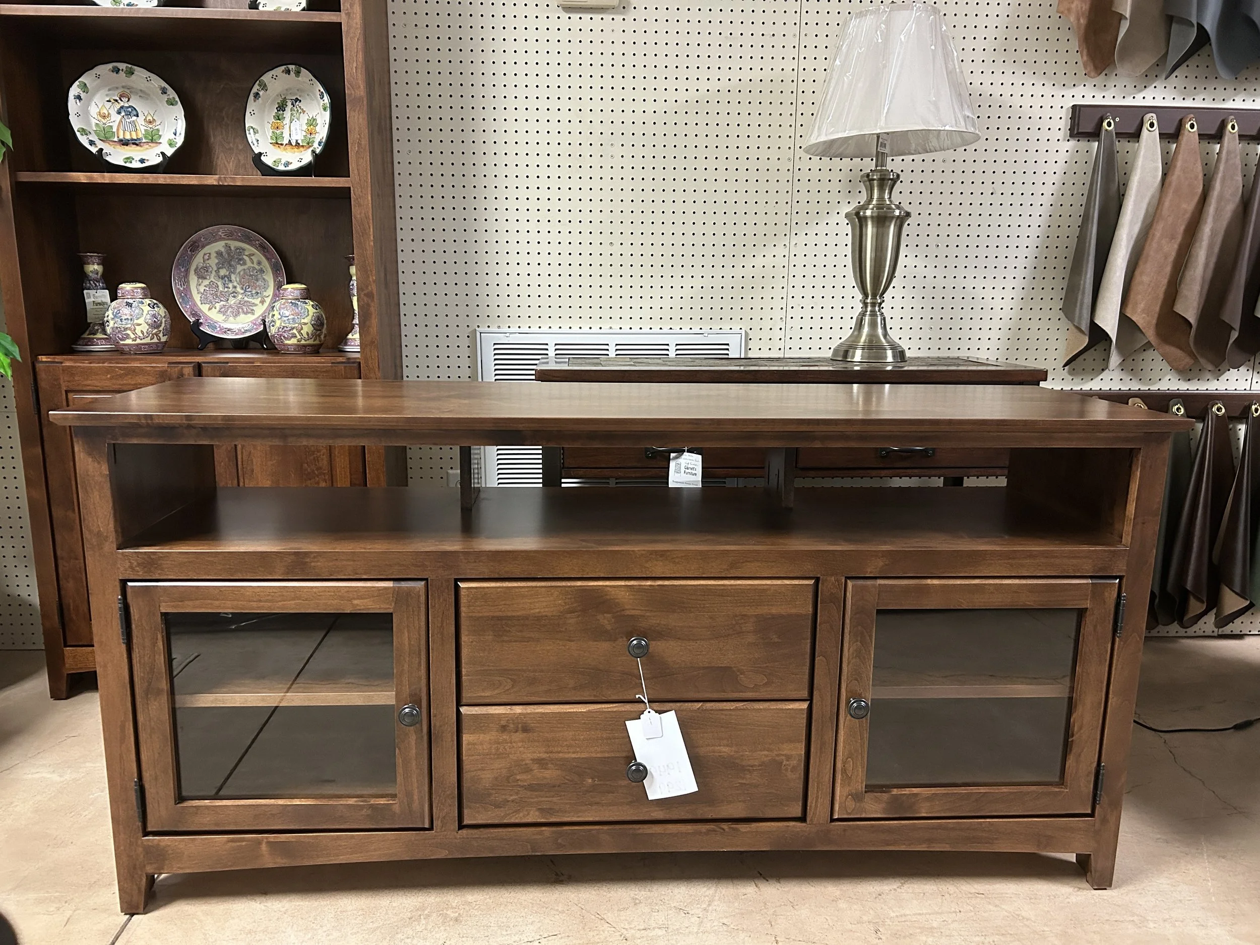 Archbold - 61” entertainment cabinet in Tuscan Brown on Alder
