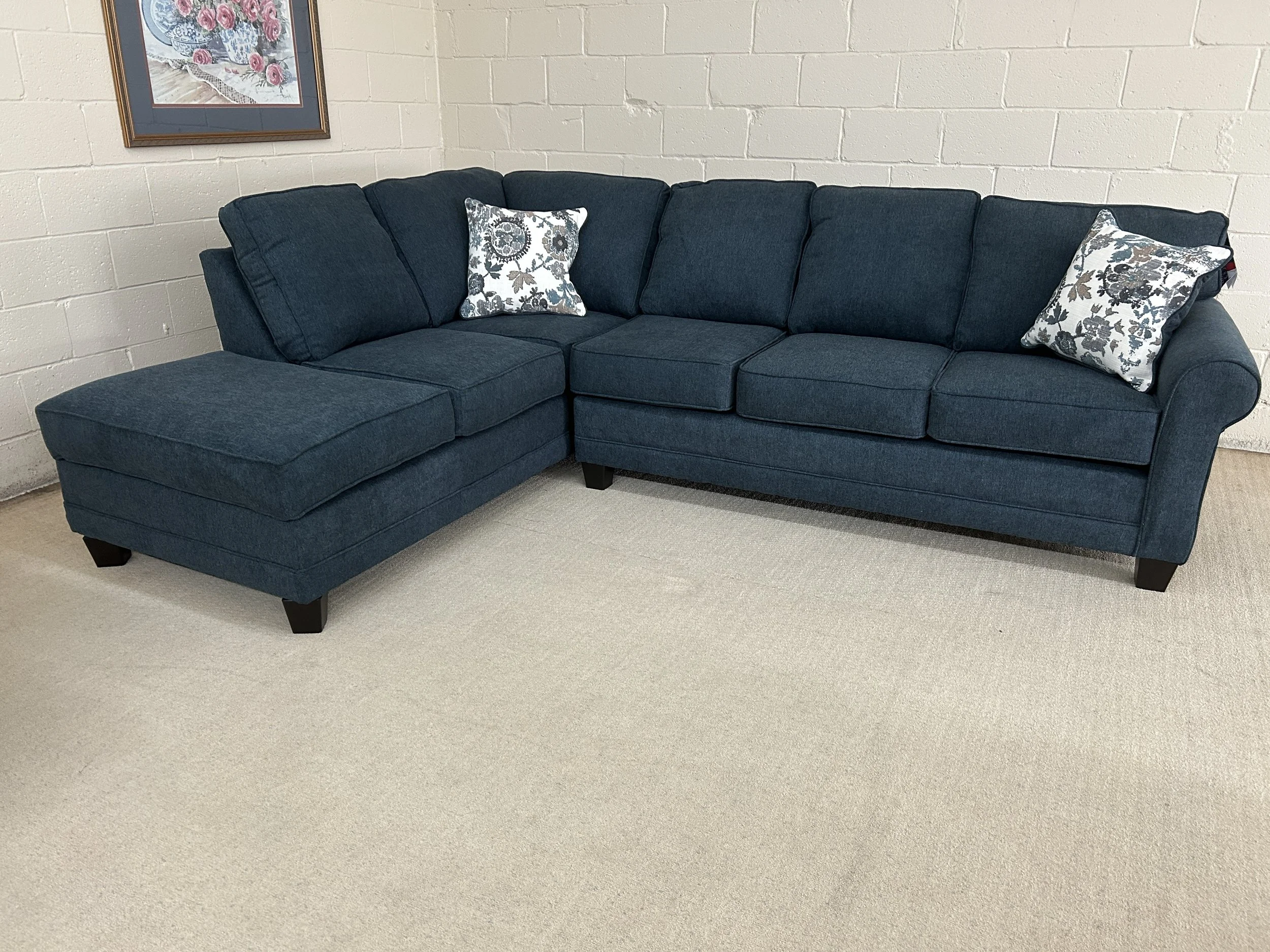 Hughes Furniture sectional sofa in Lotus Aegean dark blue fabric