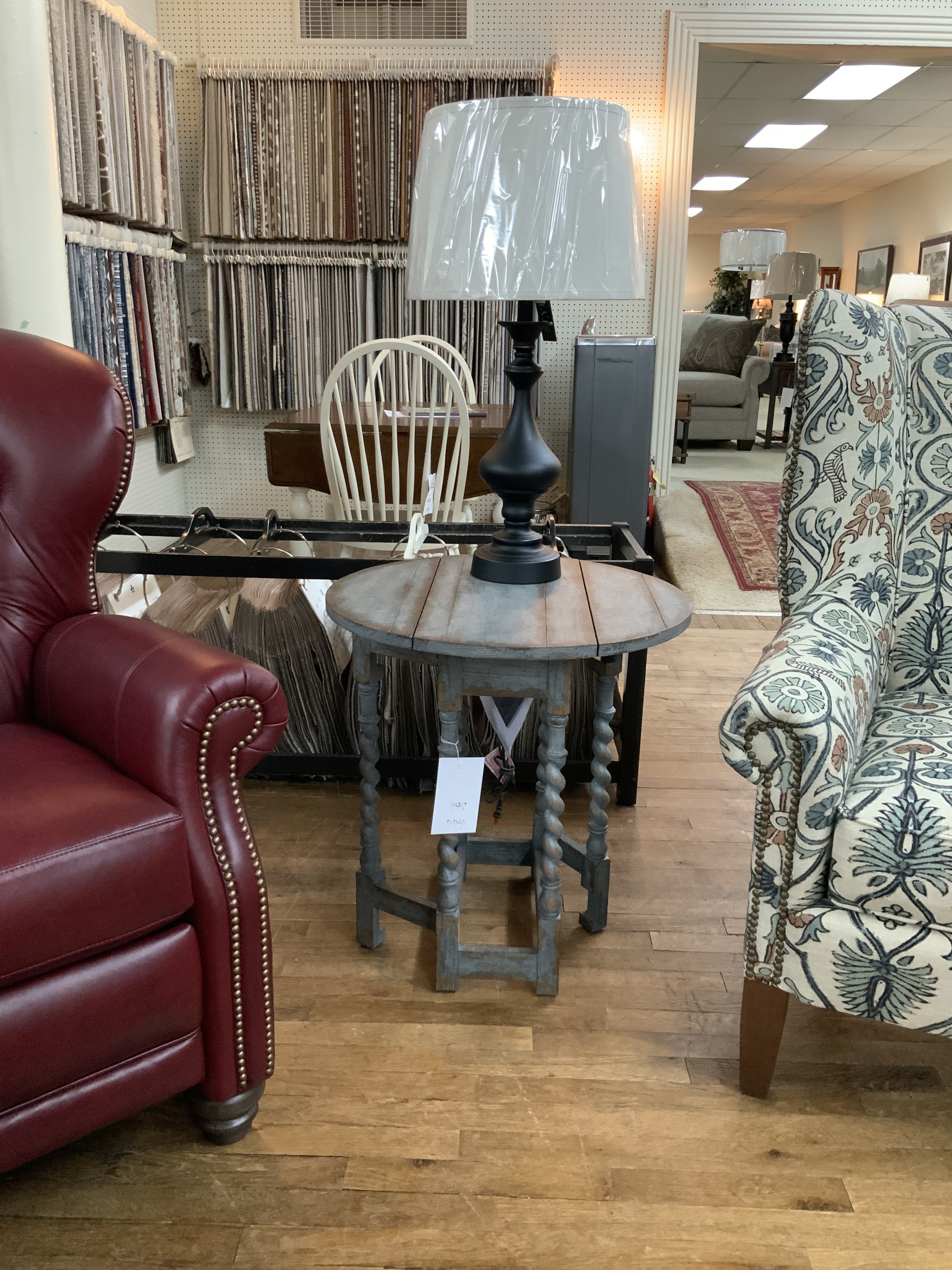 Prause Gate Leg Table by Hooker Furniture. 24“ Round in Hickory veneers with soft blue distressed finish