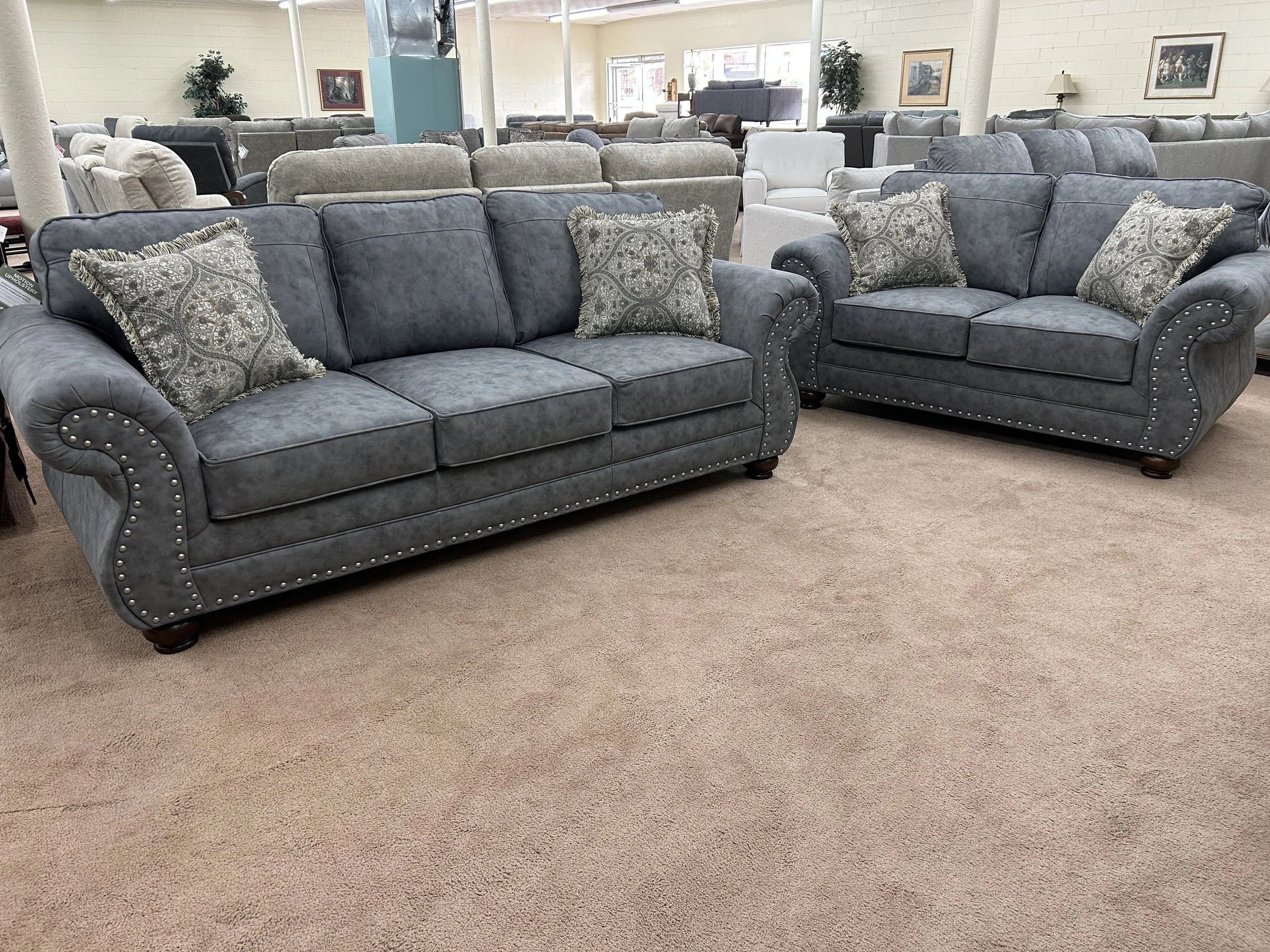 Hughes Furniture sofa and loveseat set in Dolphin Bay blue-grey fabric