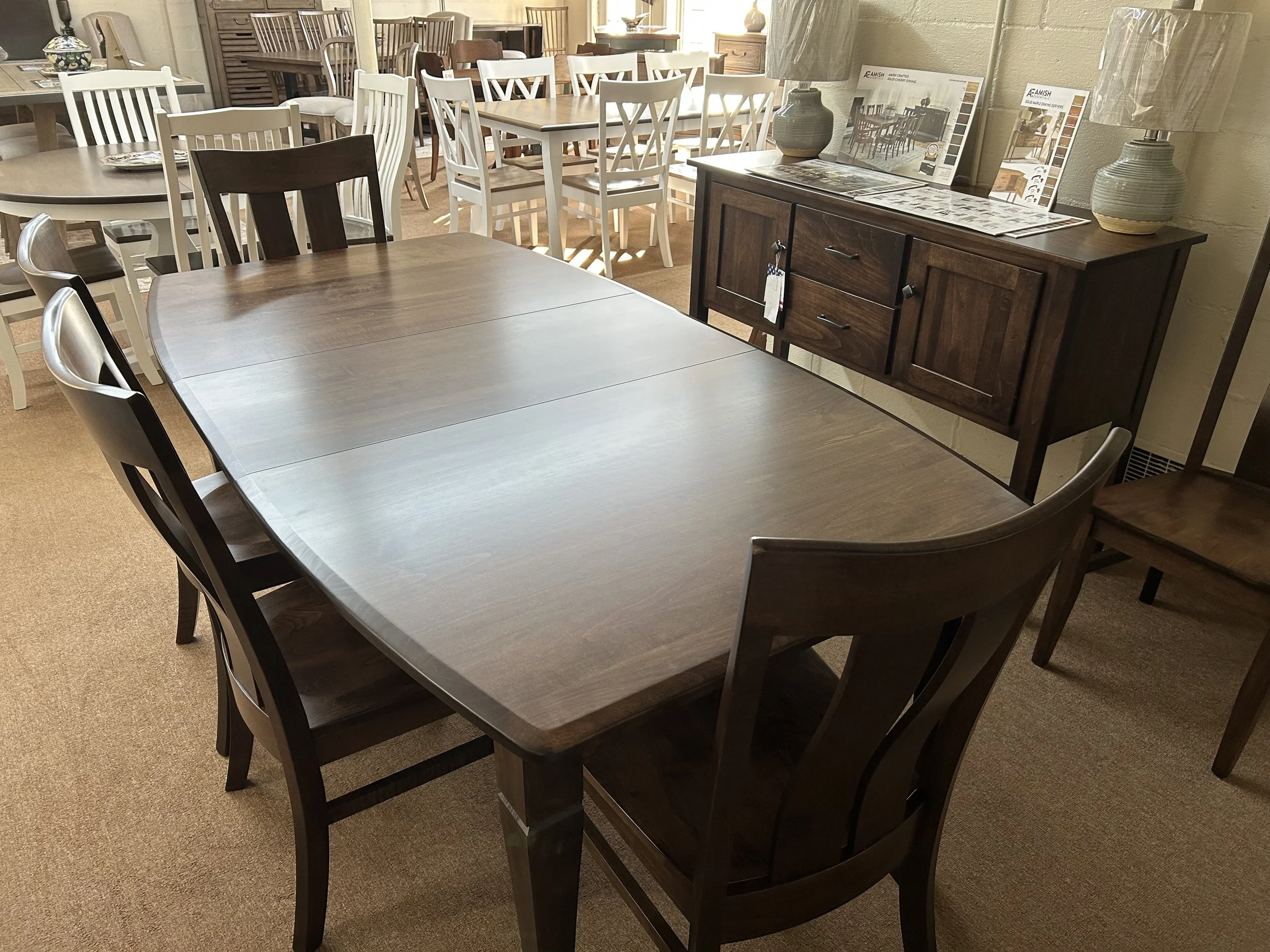 Amish Essentials- Amish made 42”x60” boat shaped table with one 18” leaf (expands to 78”) and six Florence chairs in Earthtone finish on solid Maple