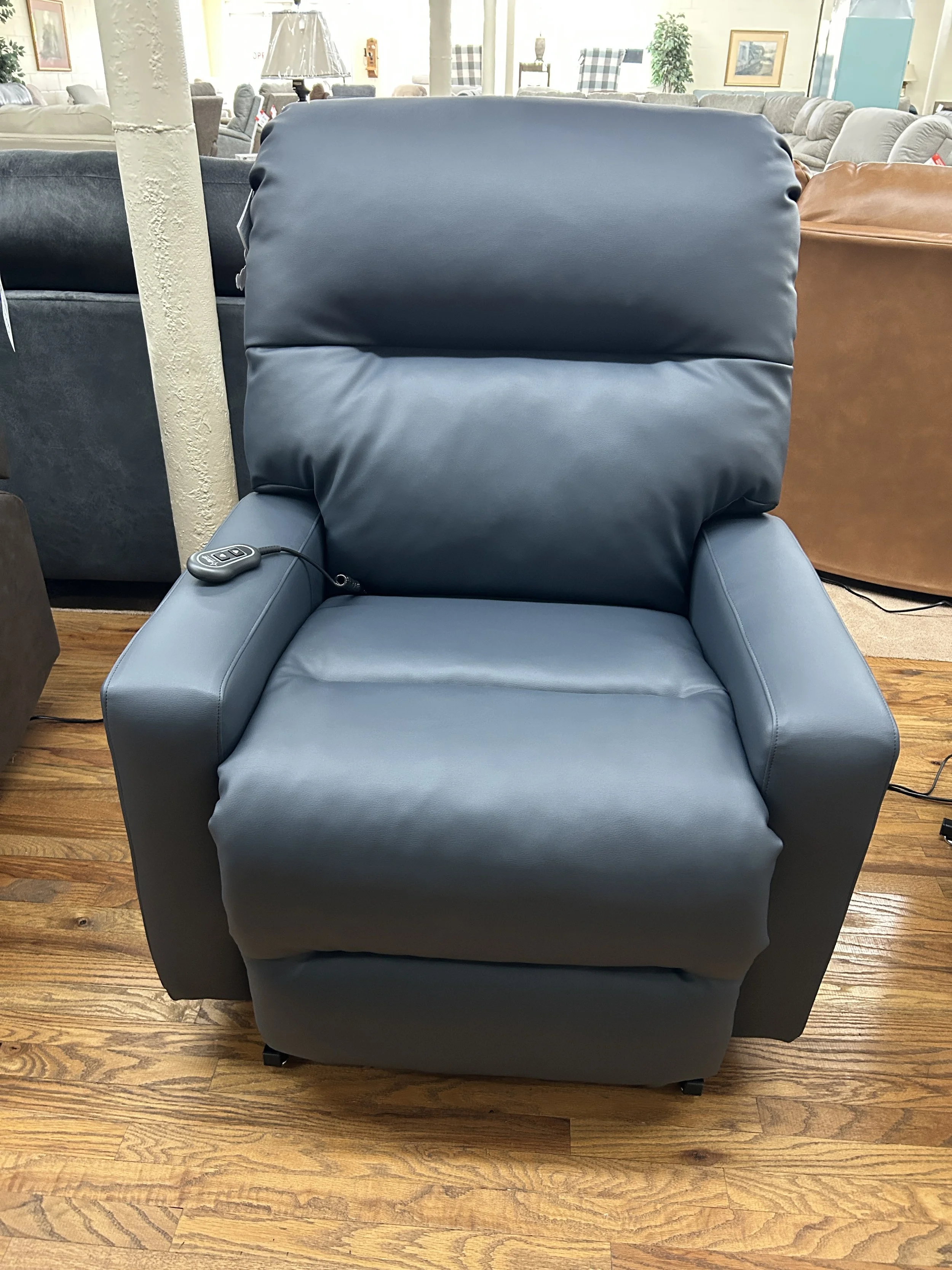 Best “Kenley” power lift recliner in midnight blue vinyl. Rated for 350 lbs.