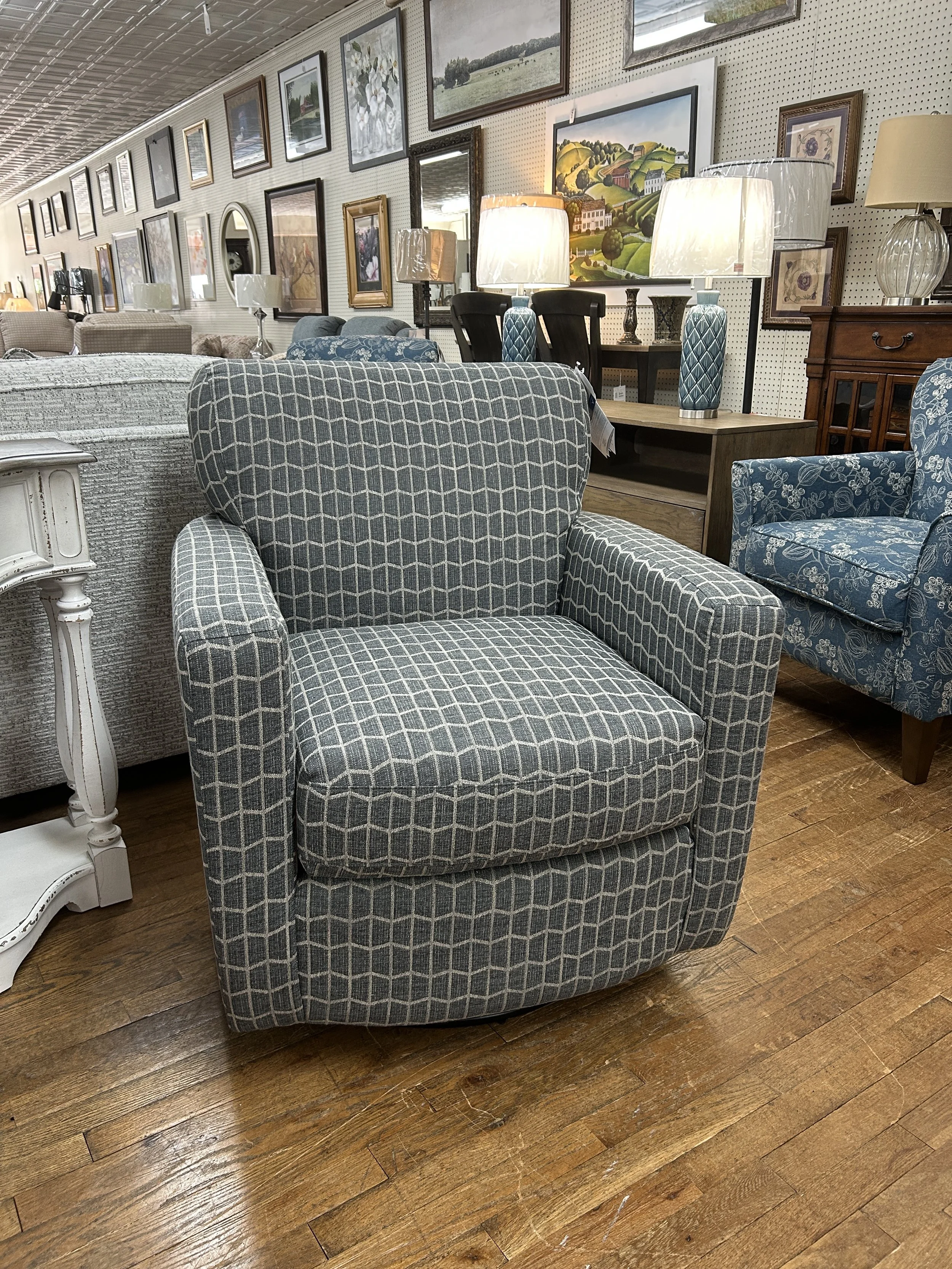 Best Home Furnishings - 'Caroly' swivel glider chair in Charcoal fabric print