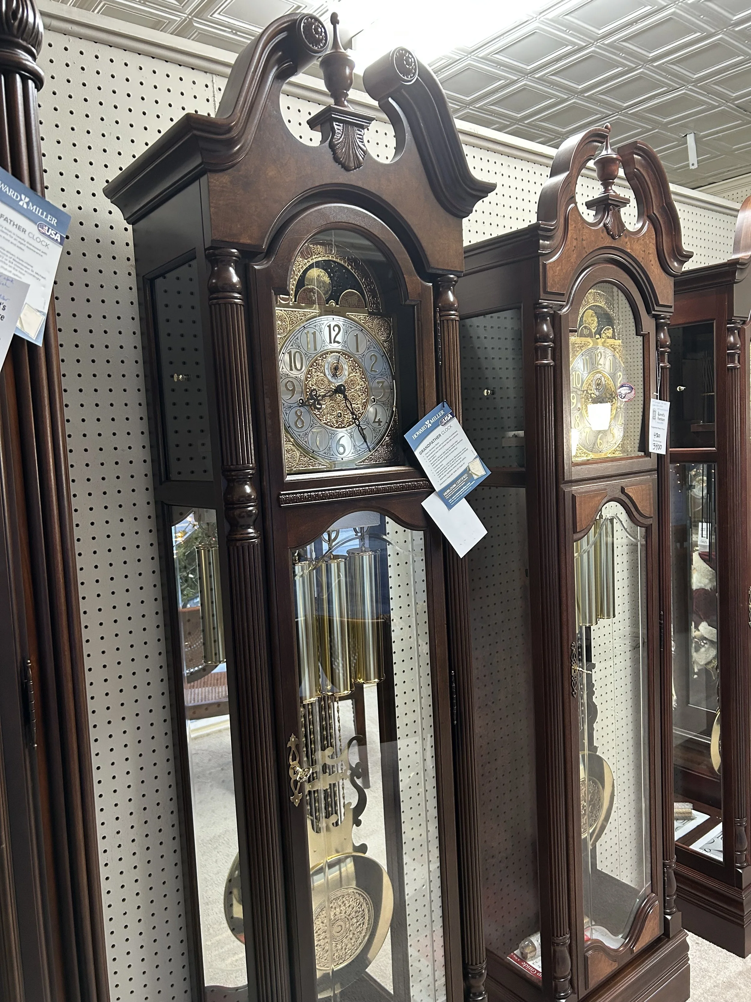 Howard Miller - Baldwin grandfather clock in cherry Bordeaux finish