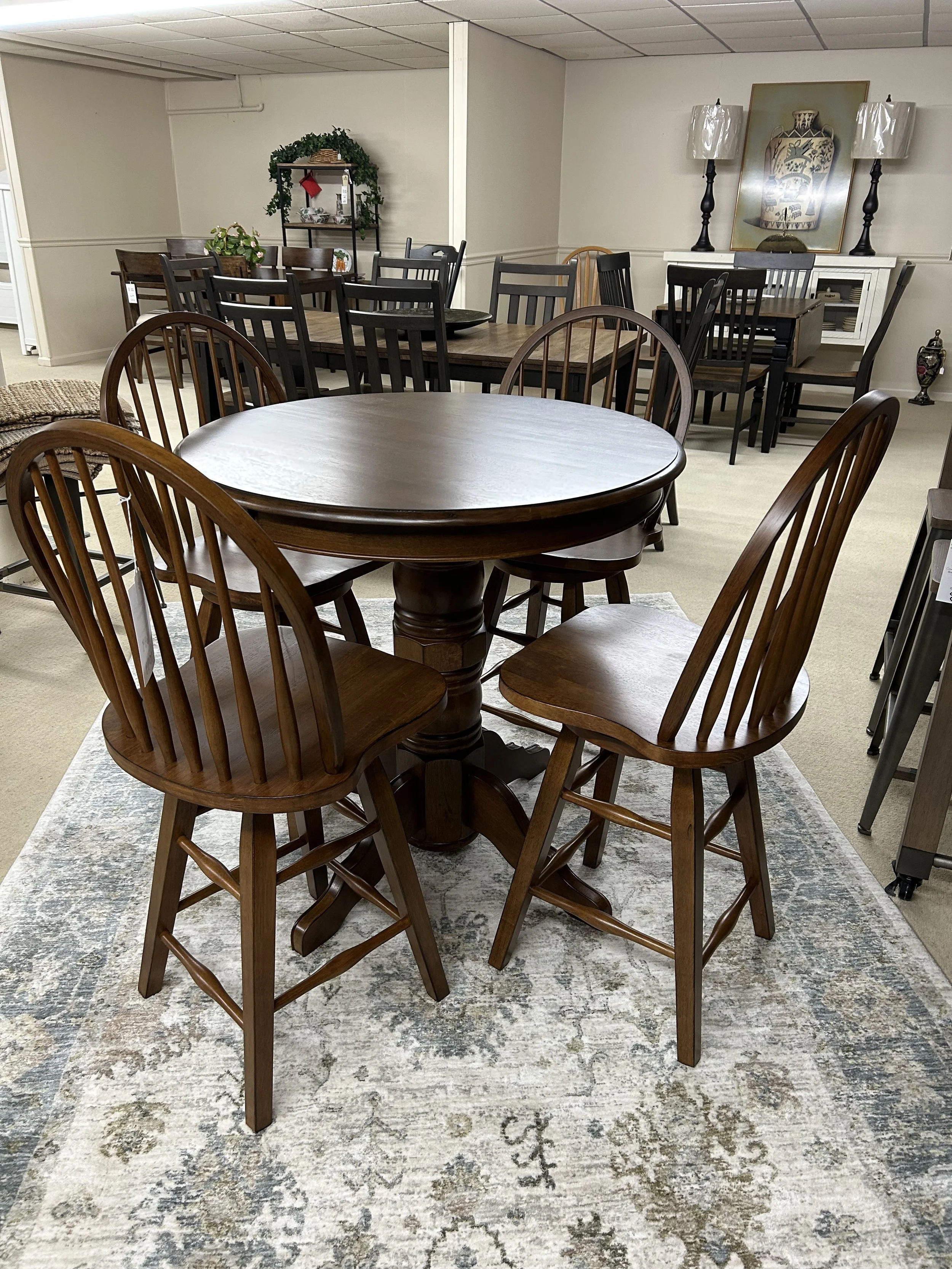 TEI - Solid hardwood 36" round pub-height table with four swivel barstools in tobacco brown finish from the St Michael collection