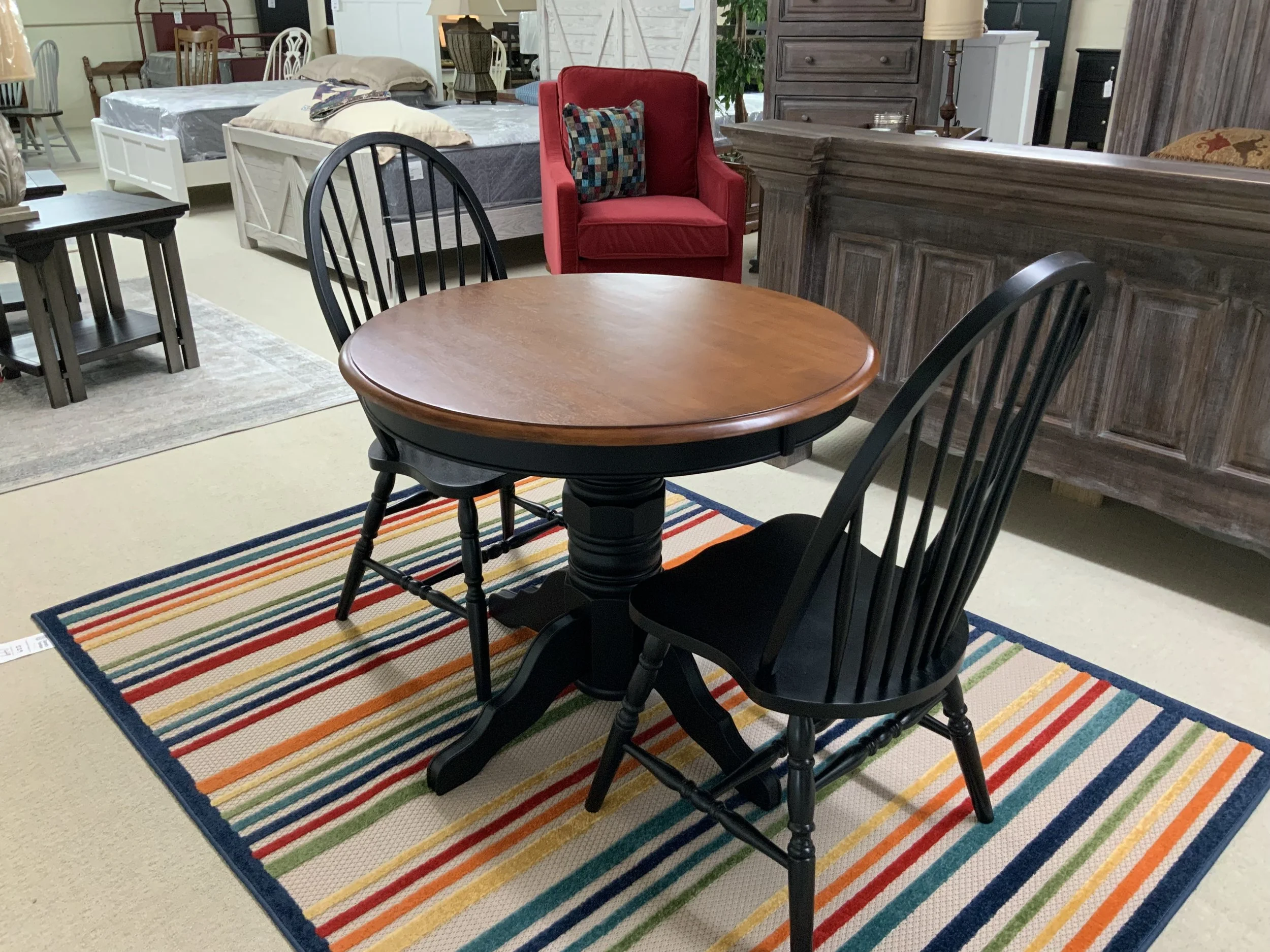 36” round table (30” high) in two tone finish with two side chairs by TEI