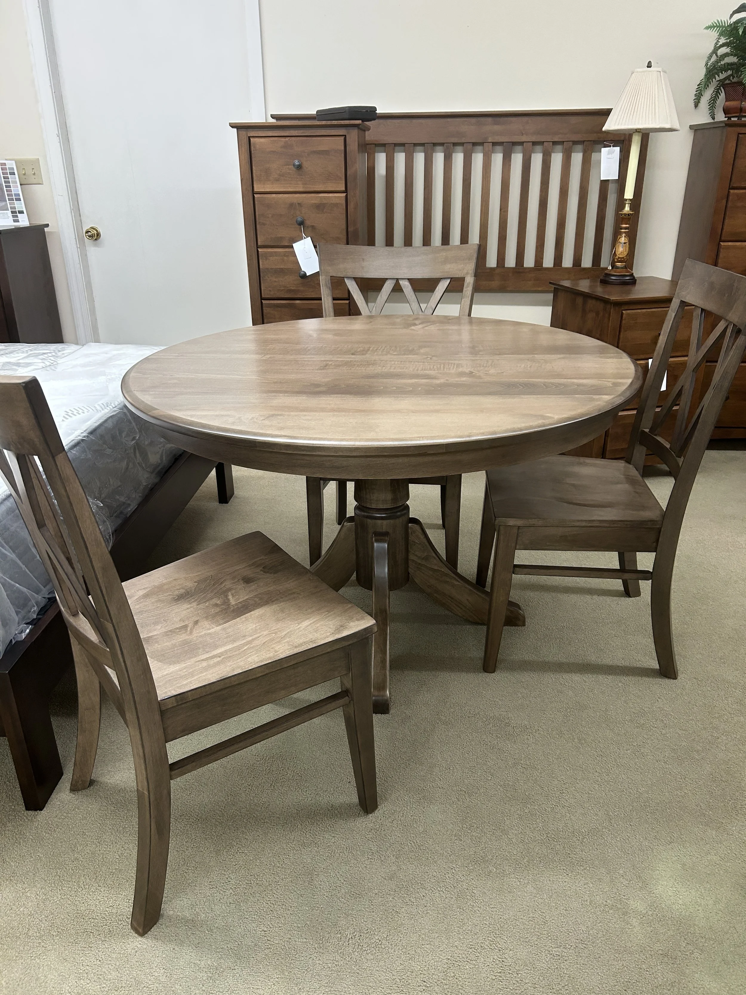 Archbold Amish Essentials - 48" round solid Maple pedestal table with one 18" leaf and four Emmett side chairs in sandstone finish