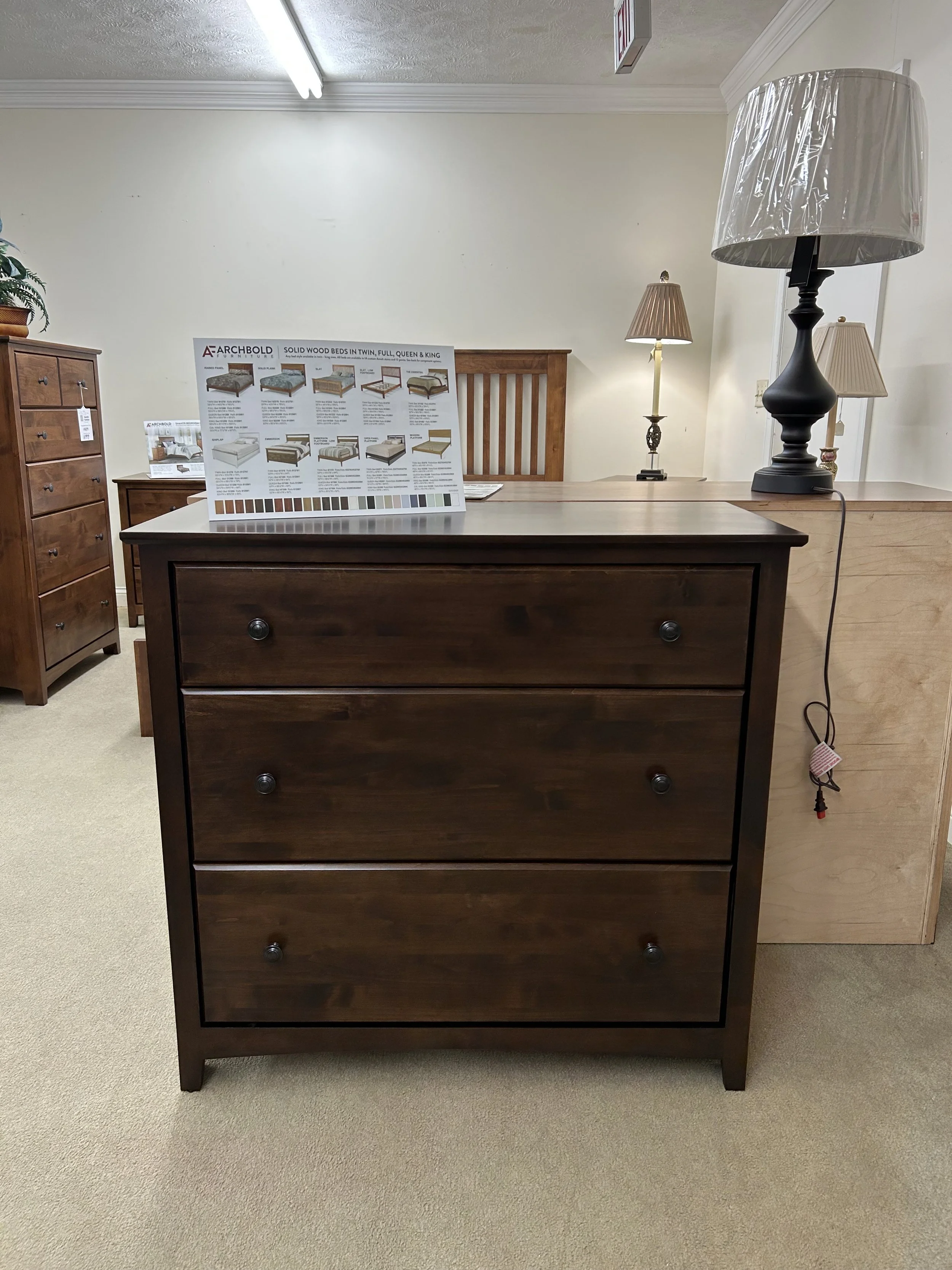 Archbold- three drawer chest in brown mahogany finish on solid Alder