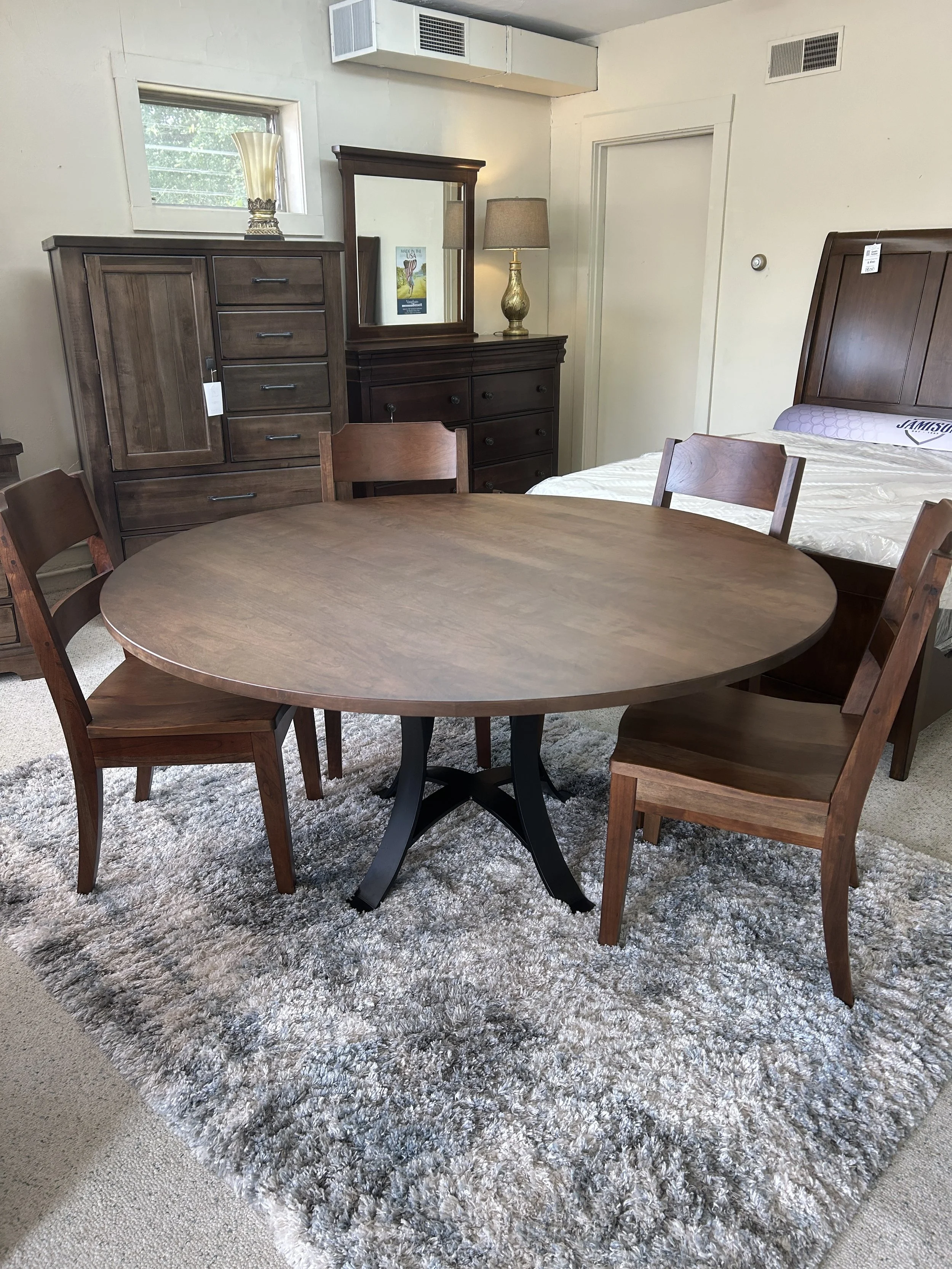 Artisan Post - 60" round solid-cherry dining table with black metal pedestal.  Comes with 4 cherry side chairs.