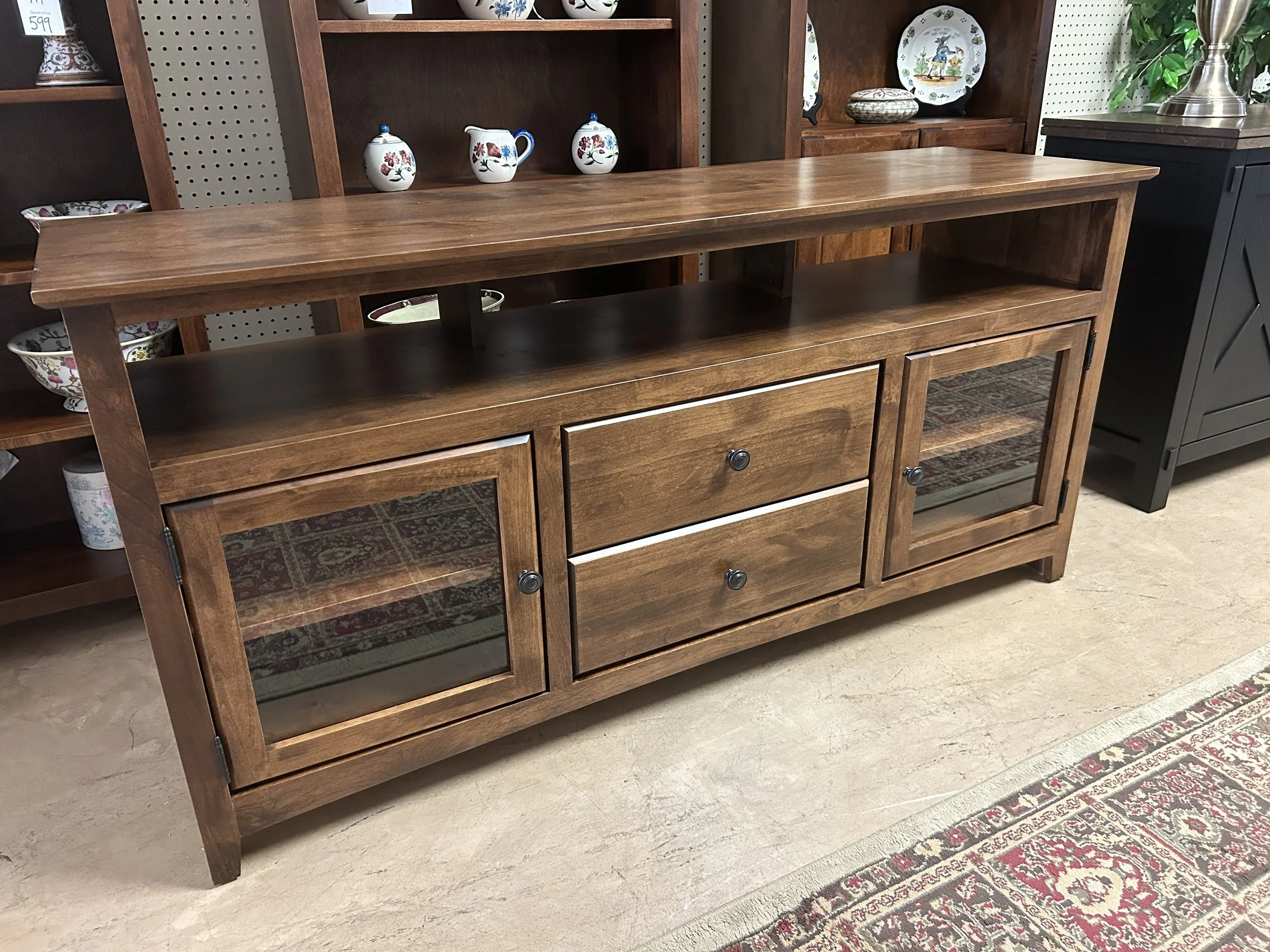 Archbold - 61" long x 30" high entertainment console in tuscan brown finish on solid Alder hardwood. Made in the USA.
