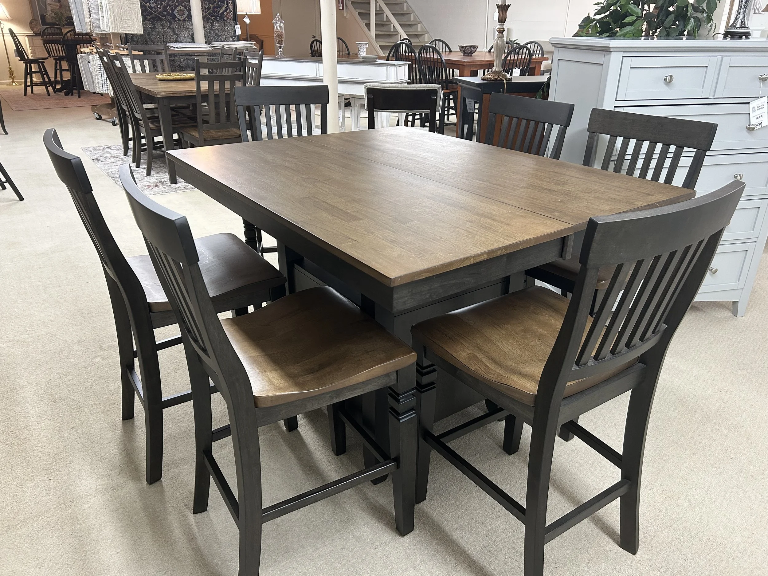 Preston Gathering Table (36“ H) in solid hardwood with two tone finish - charcoal and toffee.  Comes with six 24“ slat-back barstools