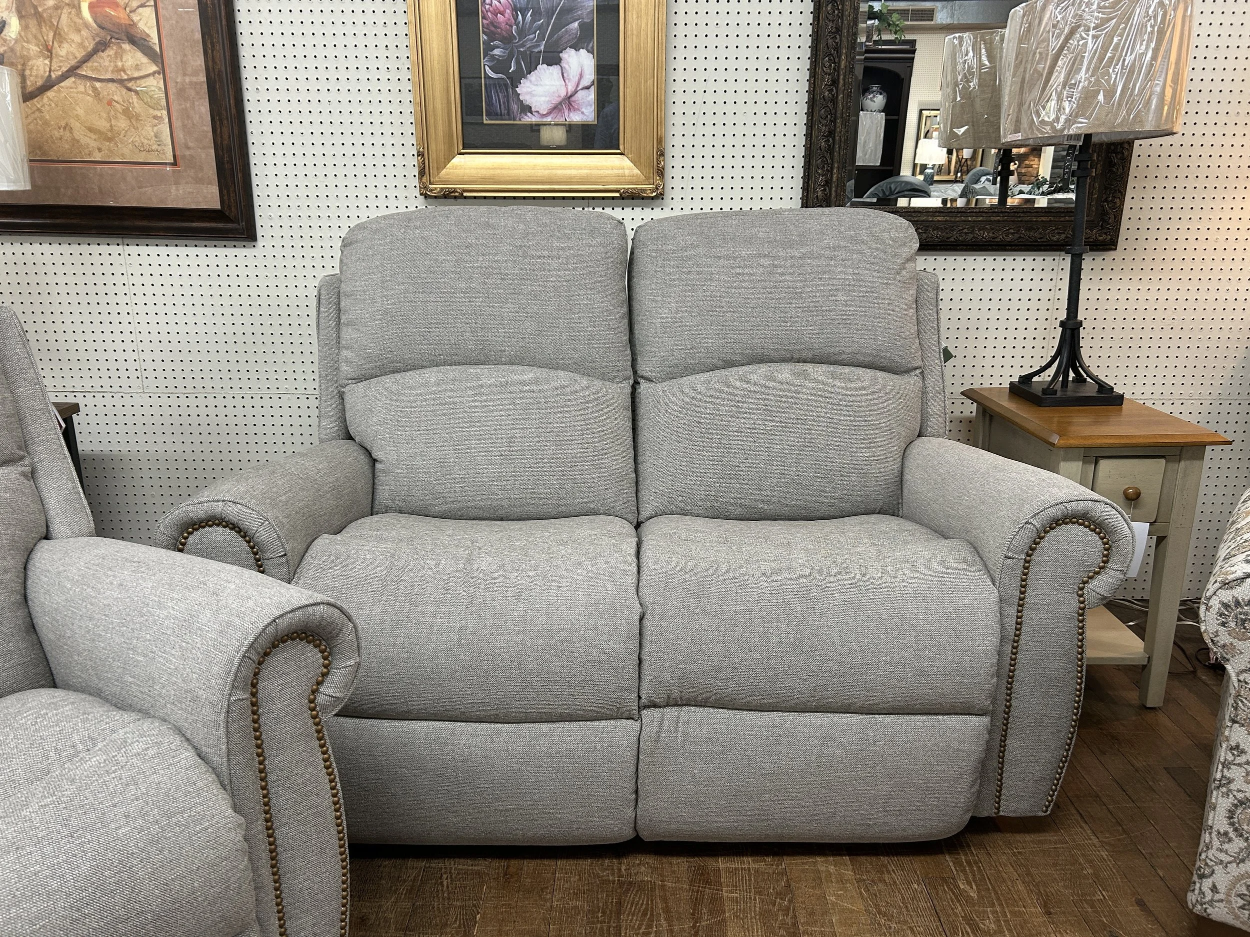 LaZBoy - Dutton reclining loveseat in light grey fabric with nailheads