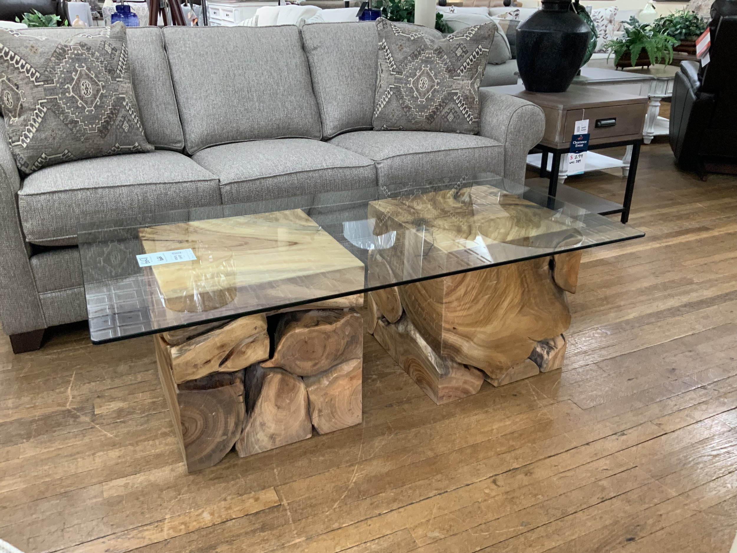 Square Root Coffee table - beveled glass top on two camphor wood bases: 54” x 28”