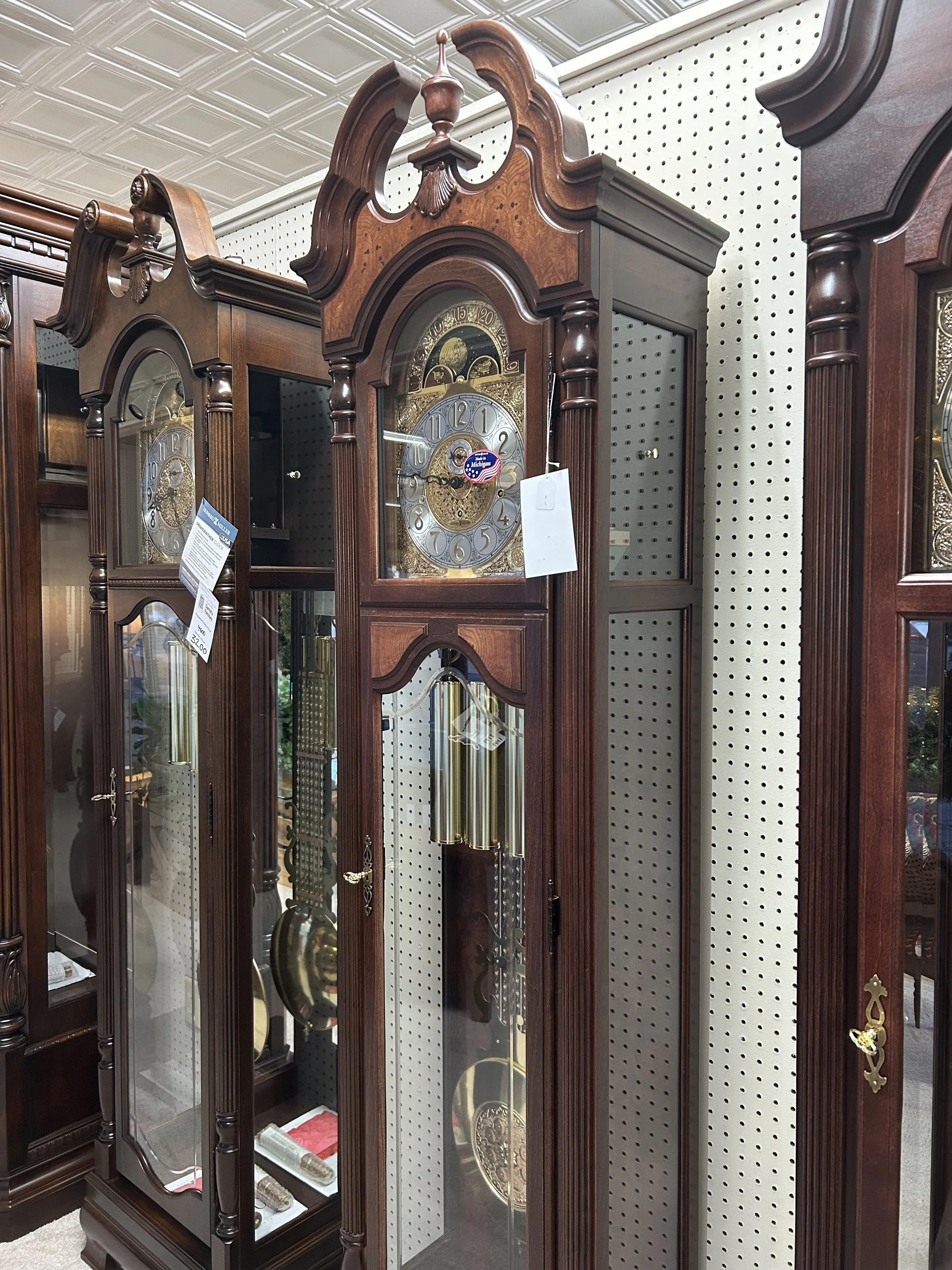 Howard Miller - Langston grandfather clock in Windsor Cherry finish