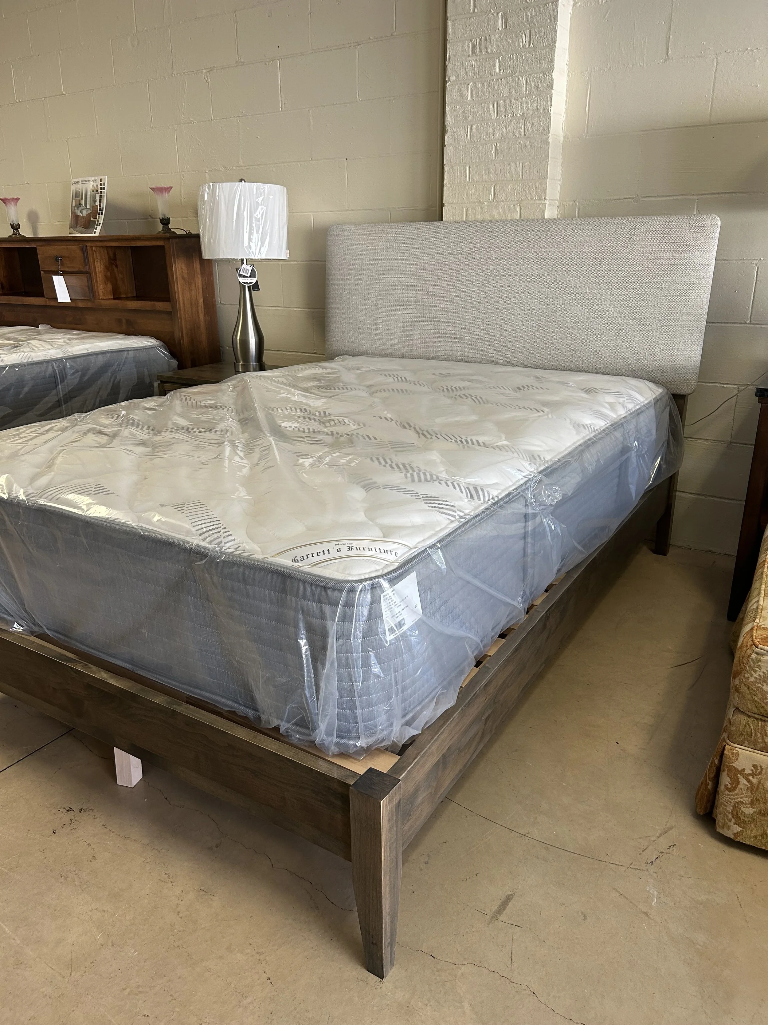 Archbold platform bed in mineral finish on solid hardwood with upholstered headboard in beige fabric.  American-made Full size bed from the Two West collection.