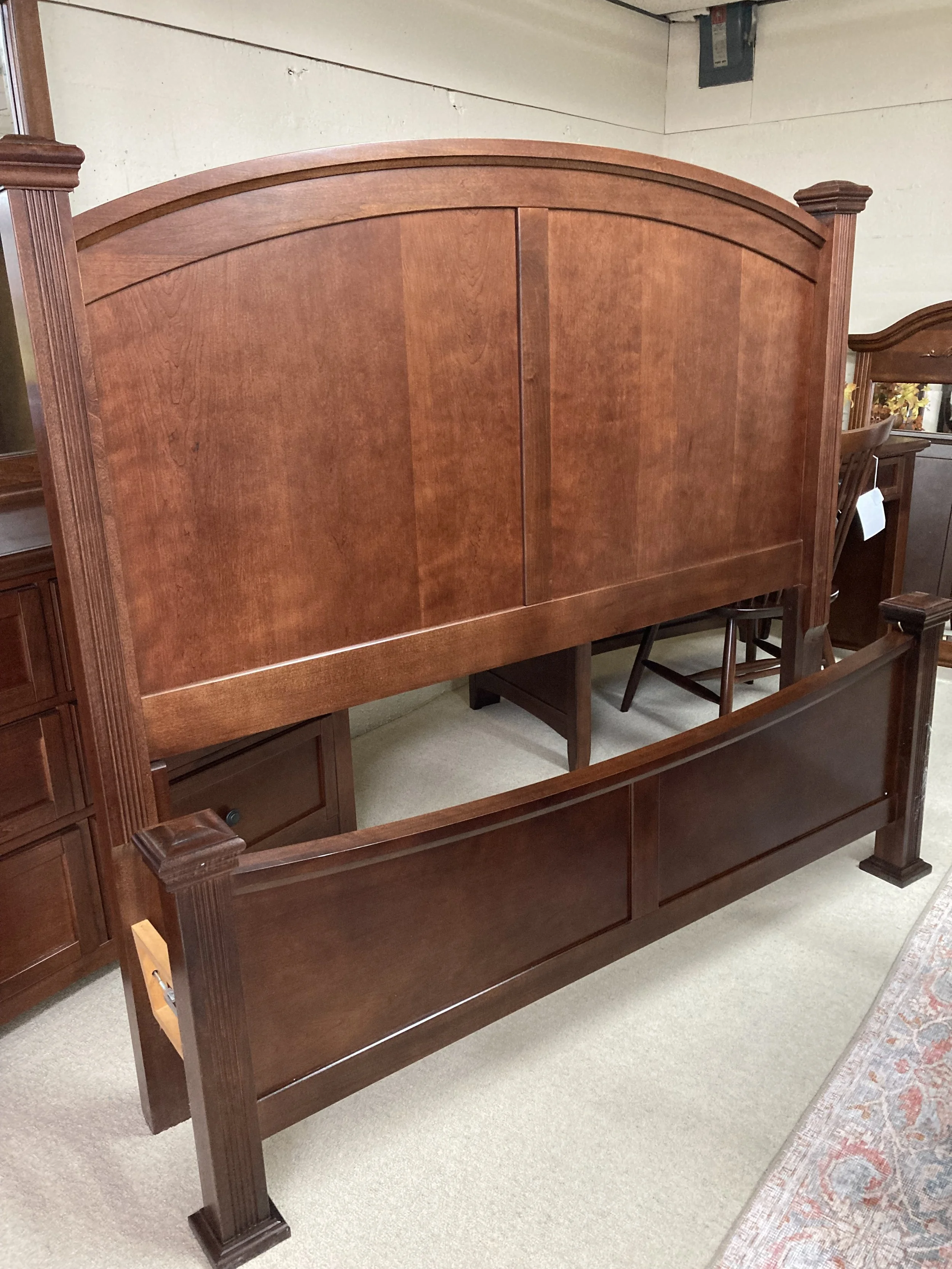Queen Poster bed in cherry finish by Vaughan Bassett