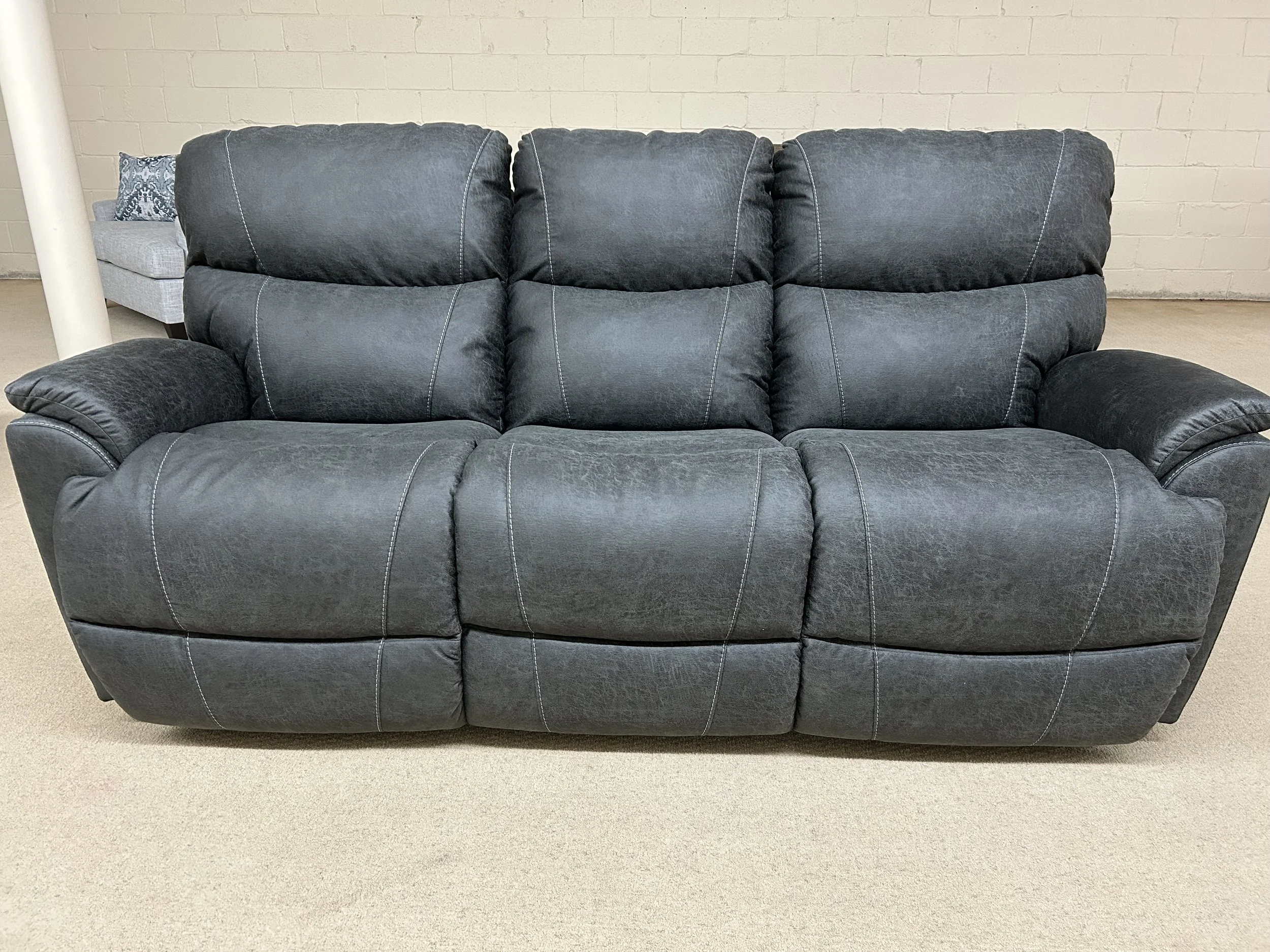 LaZBoy - Trouper manual reclining sofa in ink blue performance fabric