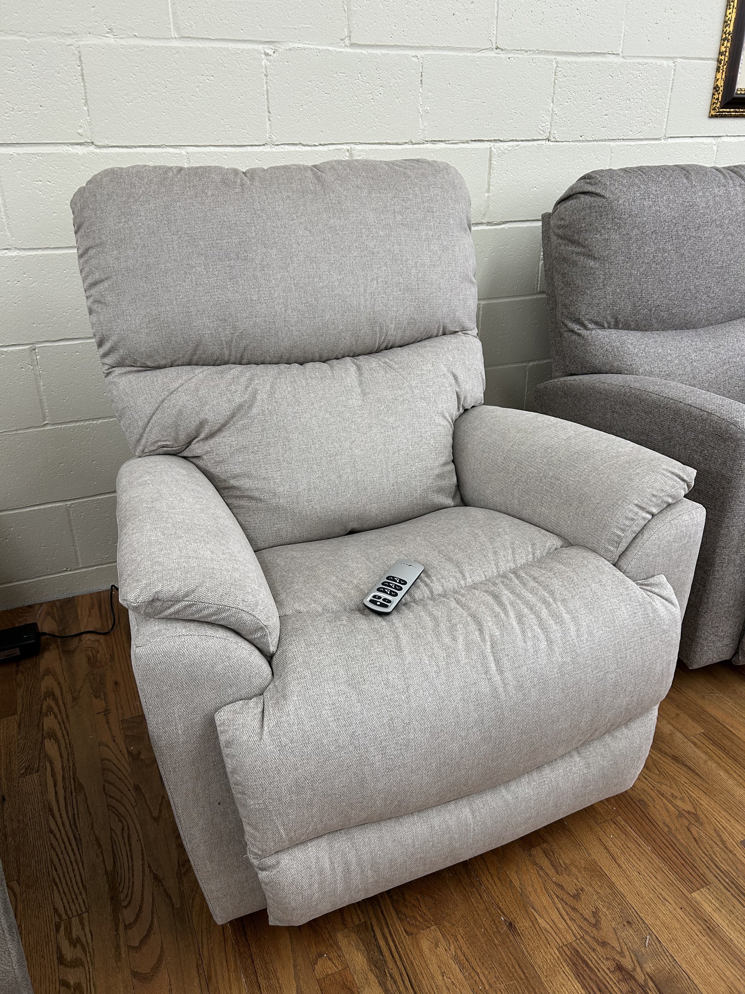 LaZBoy - power Trouper rocker recliner with power headrest in beige fabric