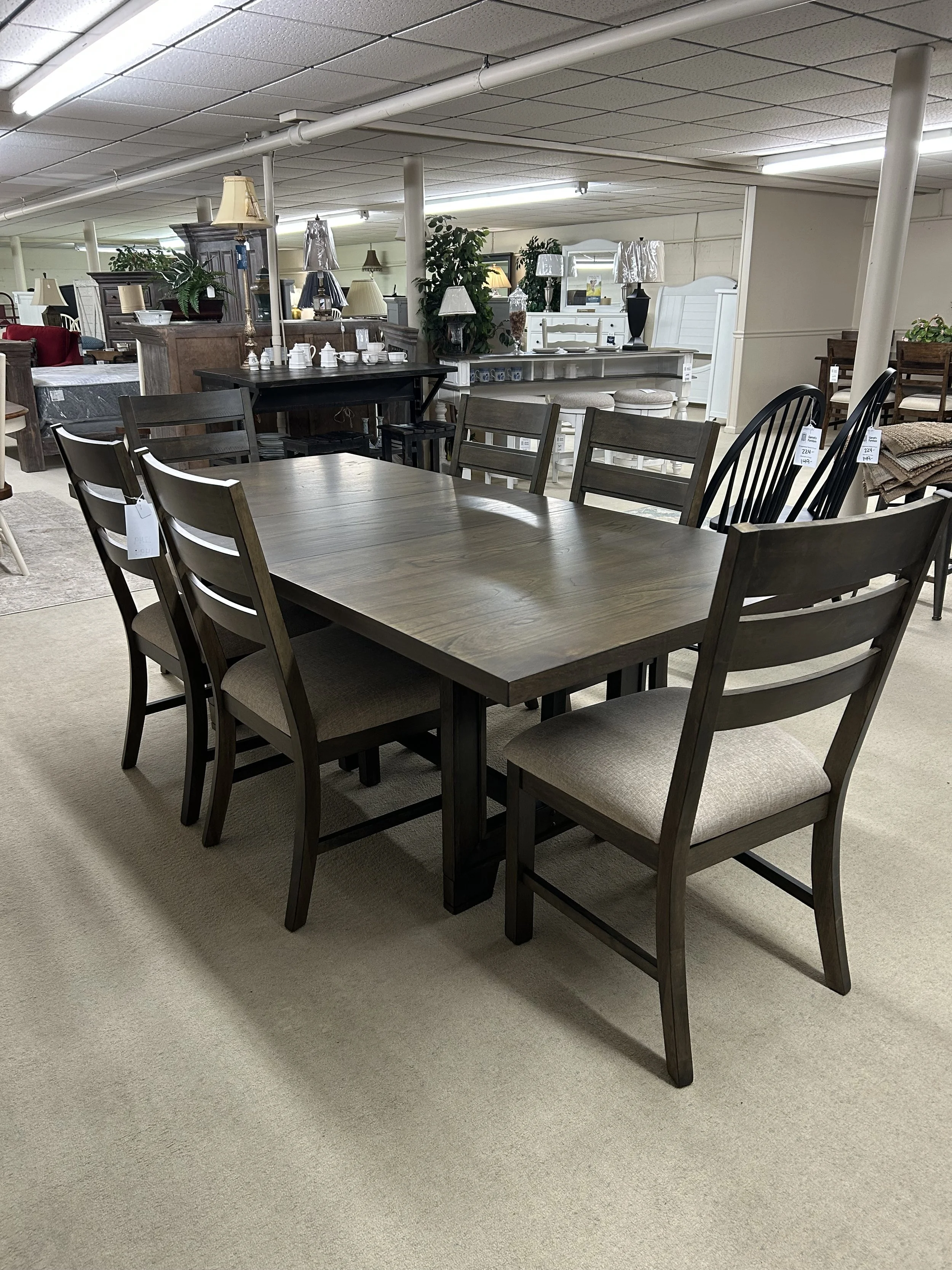 TEI - Hidden Lake 40" x 66" dining table (expands to 84" with one leaf) with veneer finish.  Comes with six upholstered side chairs