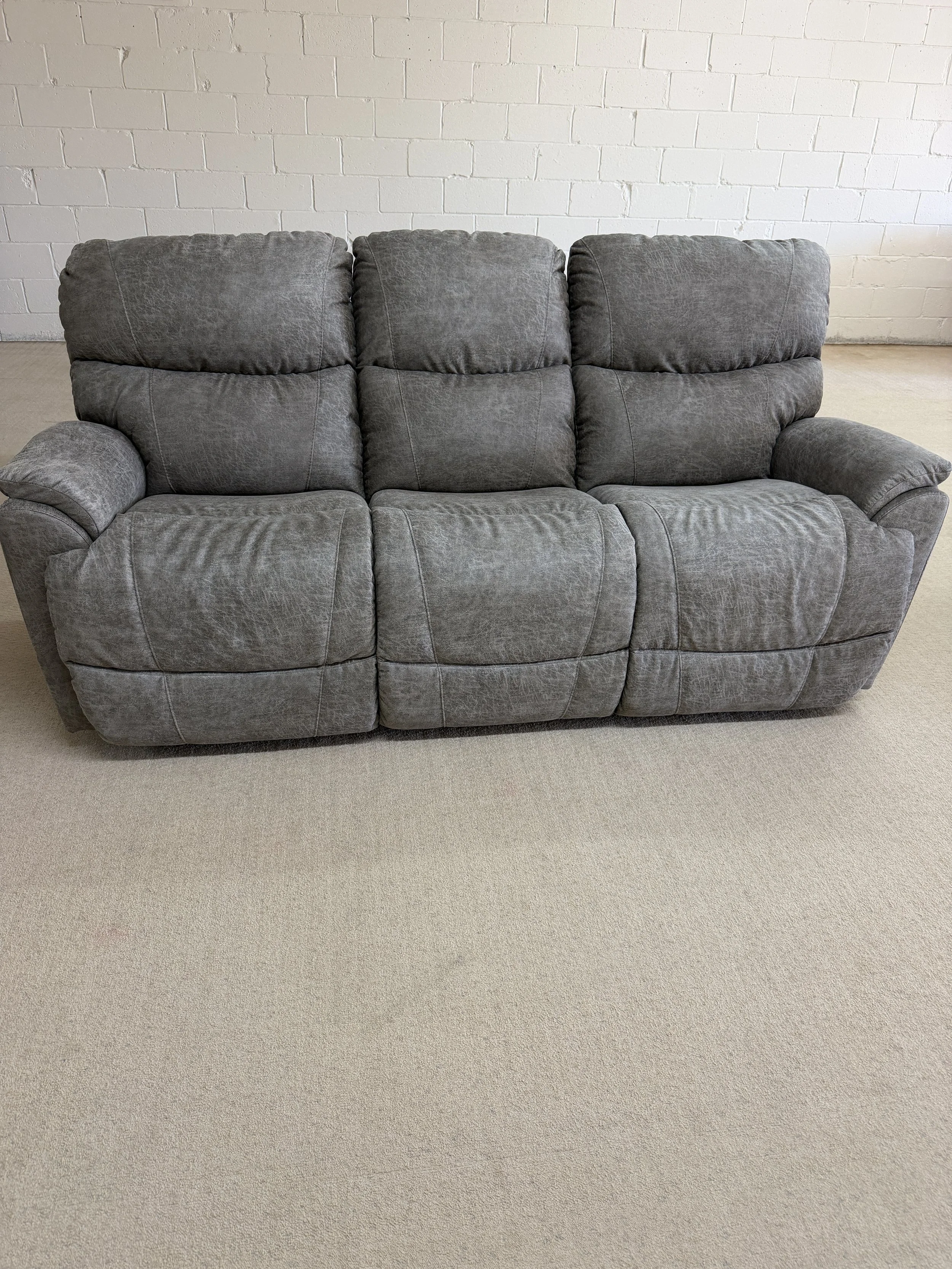 LaZBoy - Trouper manual reclining sofa in sable polyester performance fabric