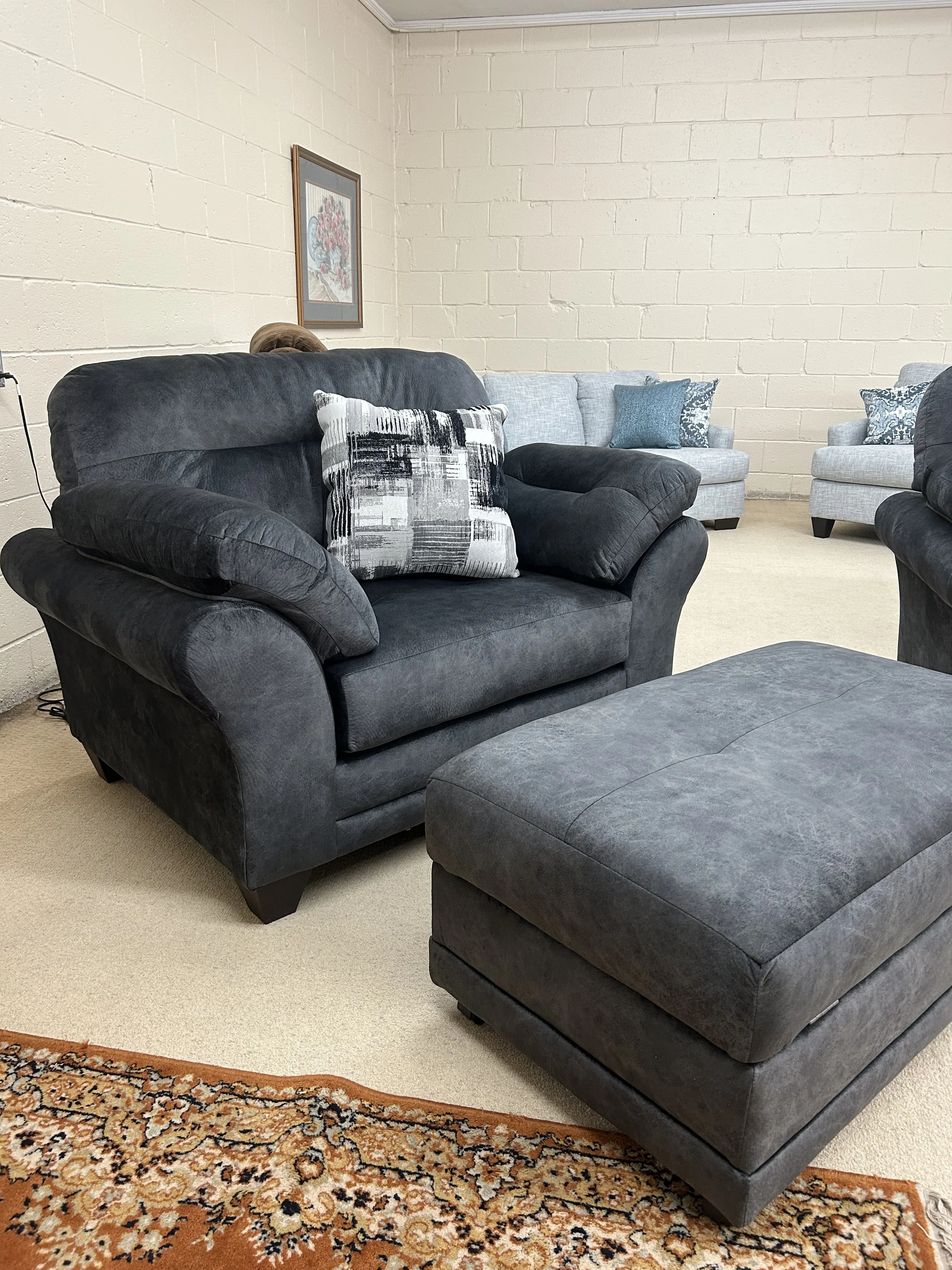 Hughes - Oversized chair and large storage ottoman in Wonderland Slate charcoal fabric