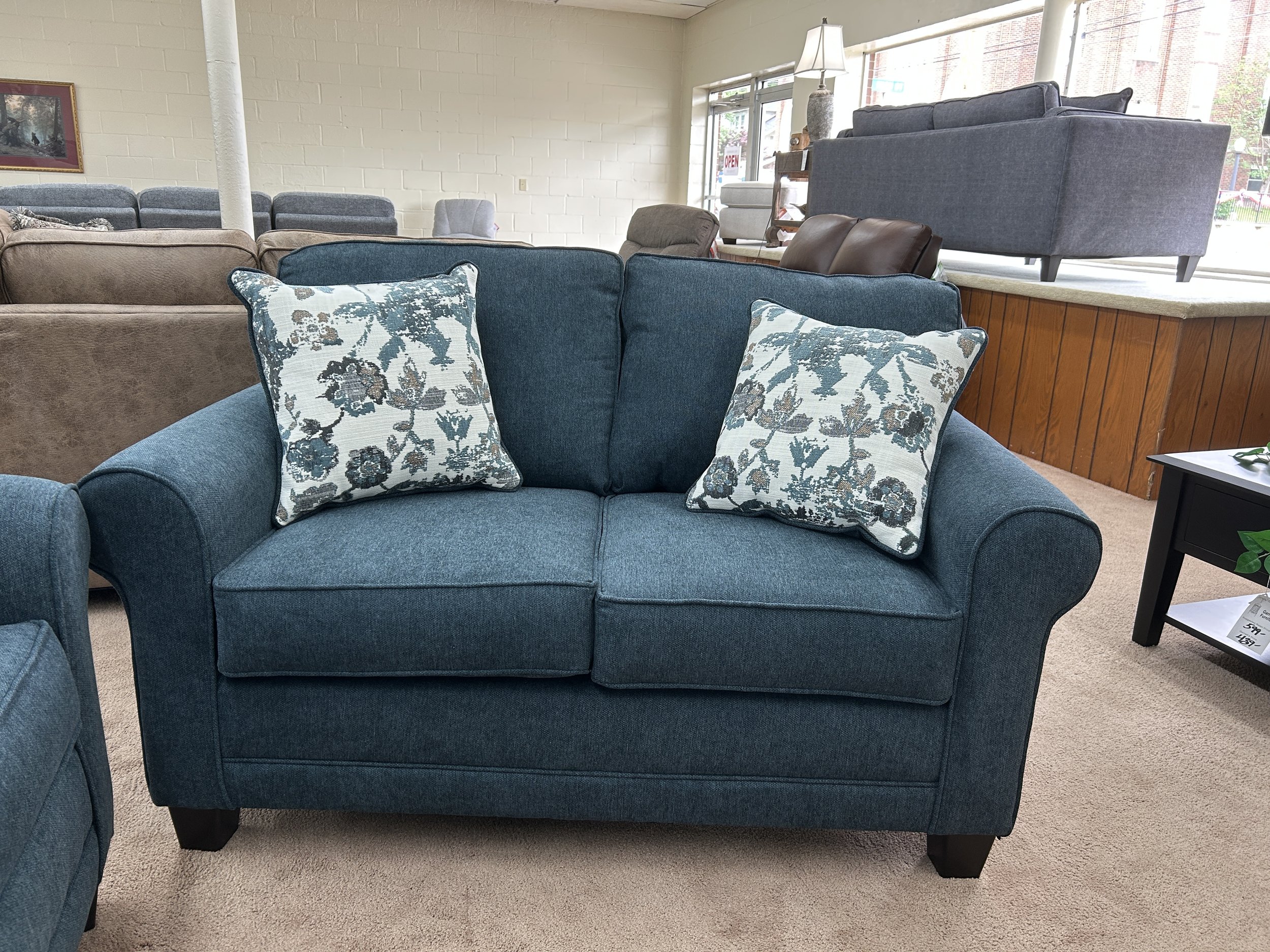 Hughes Furniture loveseat in Lotus Aegean dark blue fabric