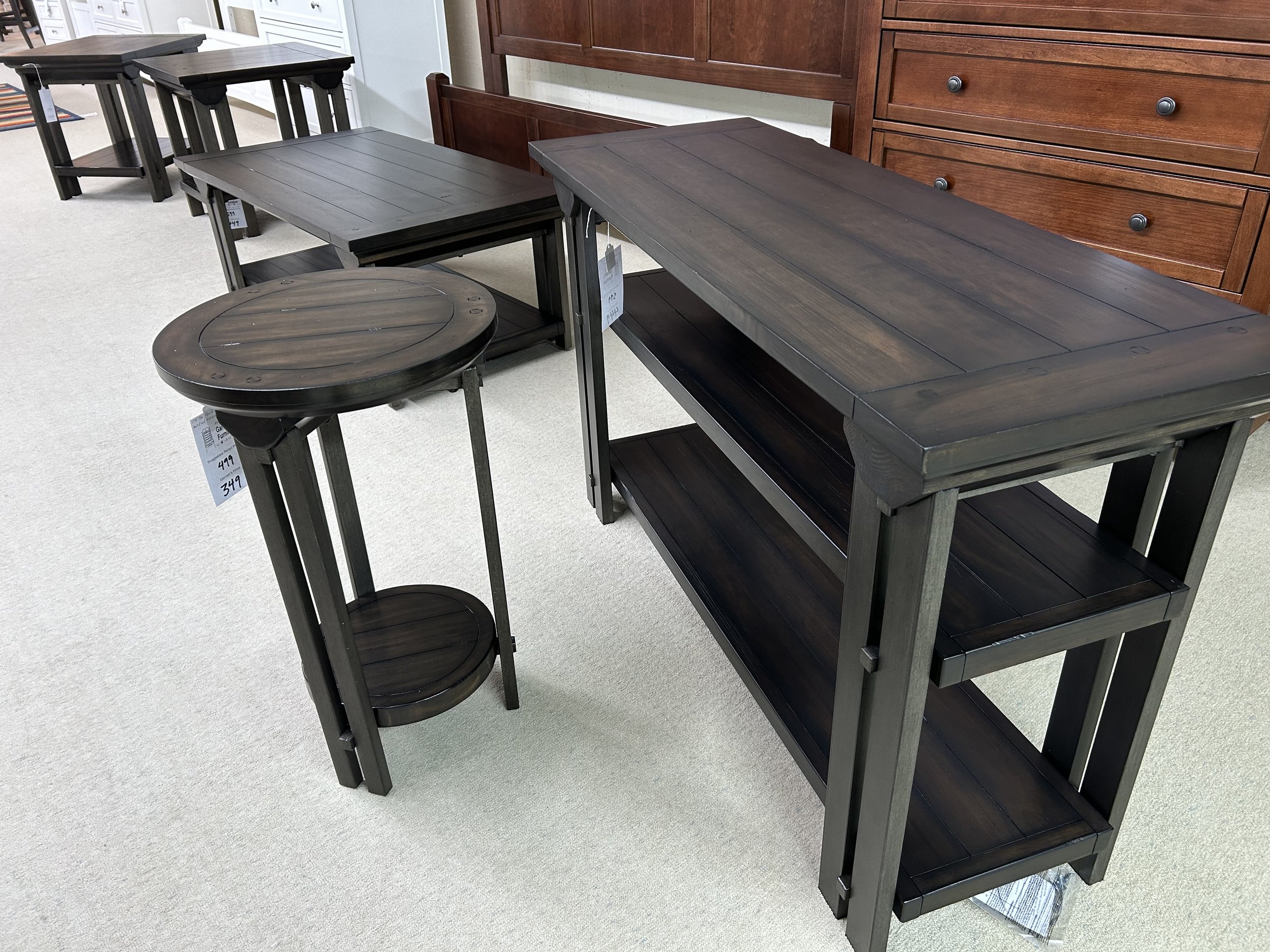 Hammary occasional group in distressed pine and metal - sofa table, rectangular end tables, round chairside, and rectangular coffee table with casters
