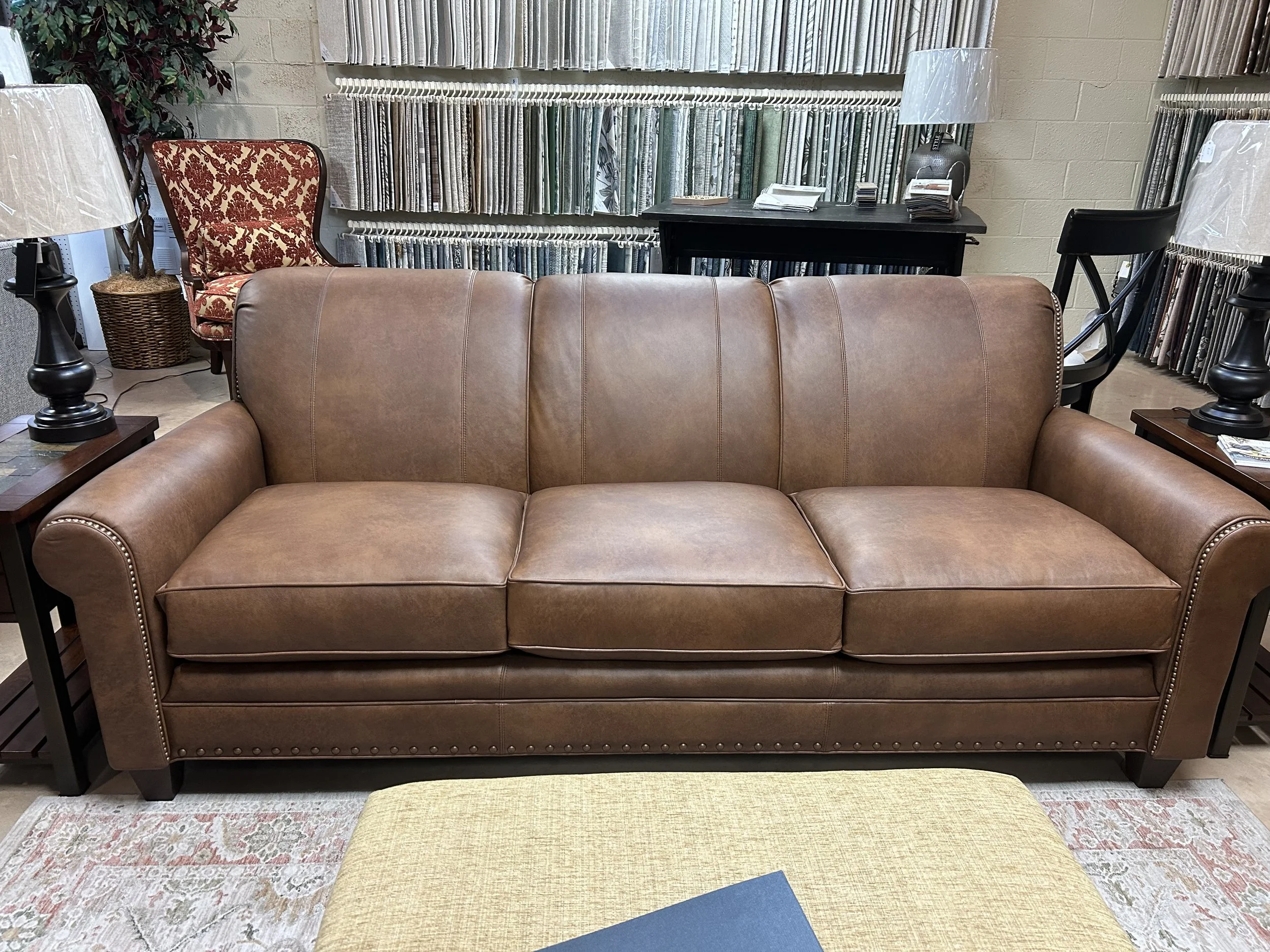 Smith Bros rolled tight-back cocoa leather sofa