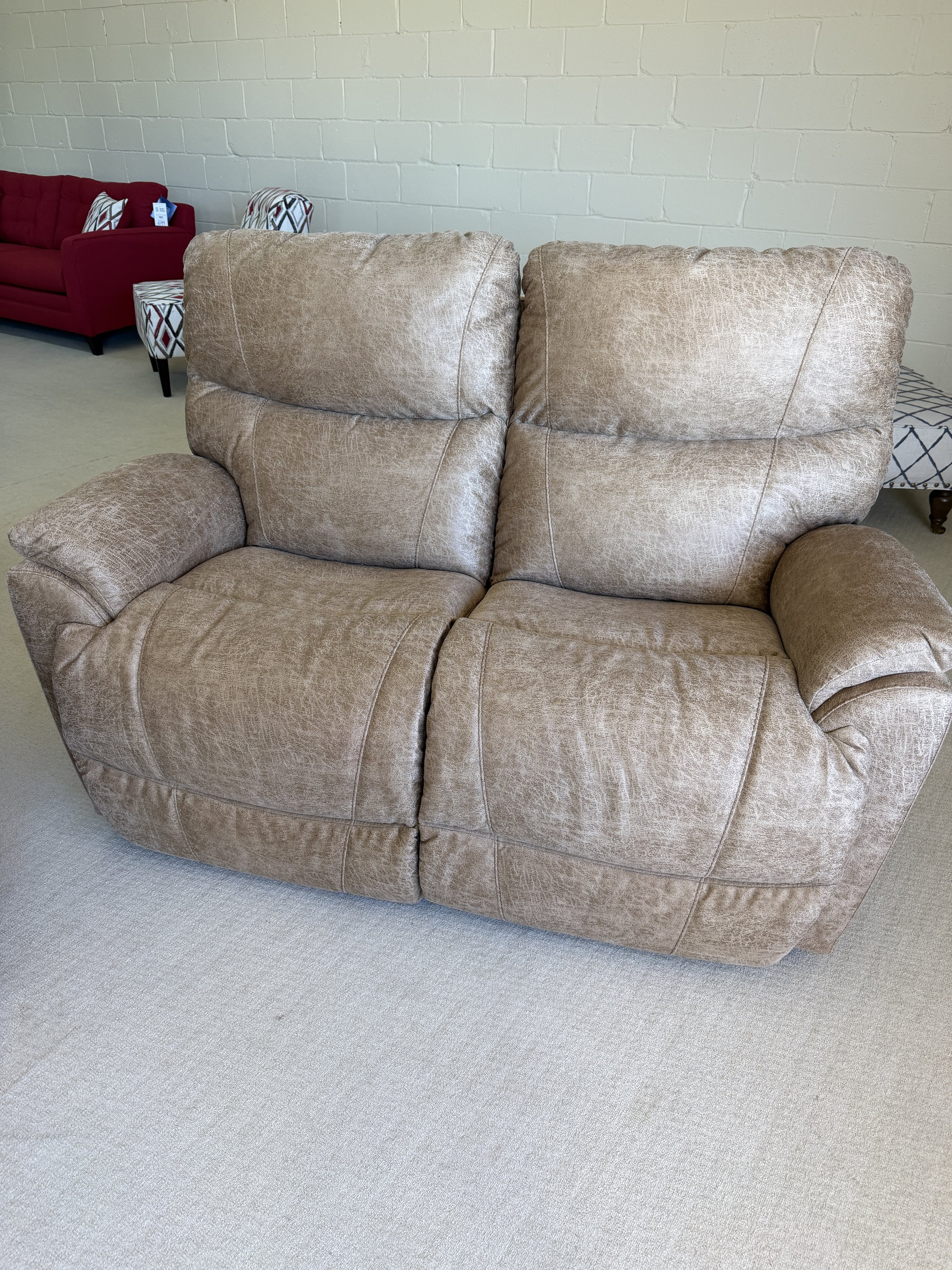 LaZBoy - Trouper manual reclining sofa in camel polyester performance fabric