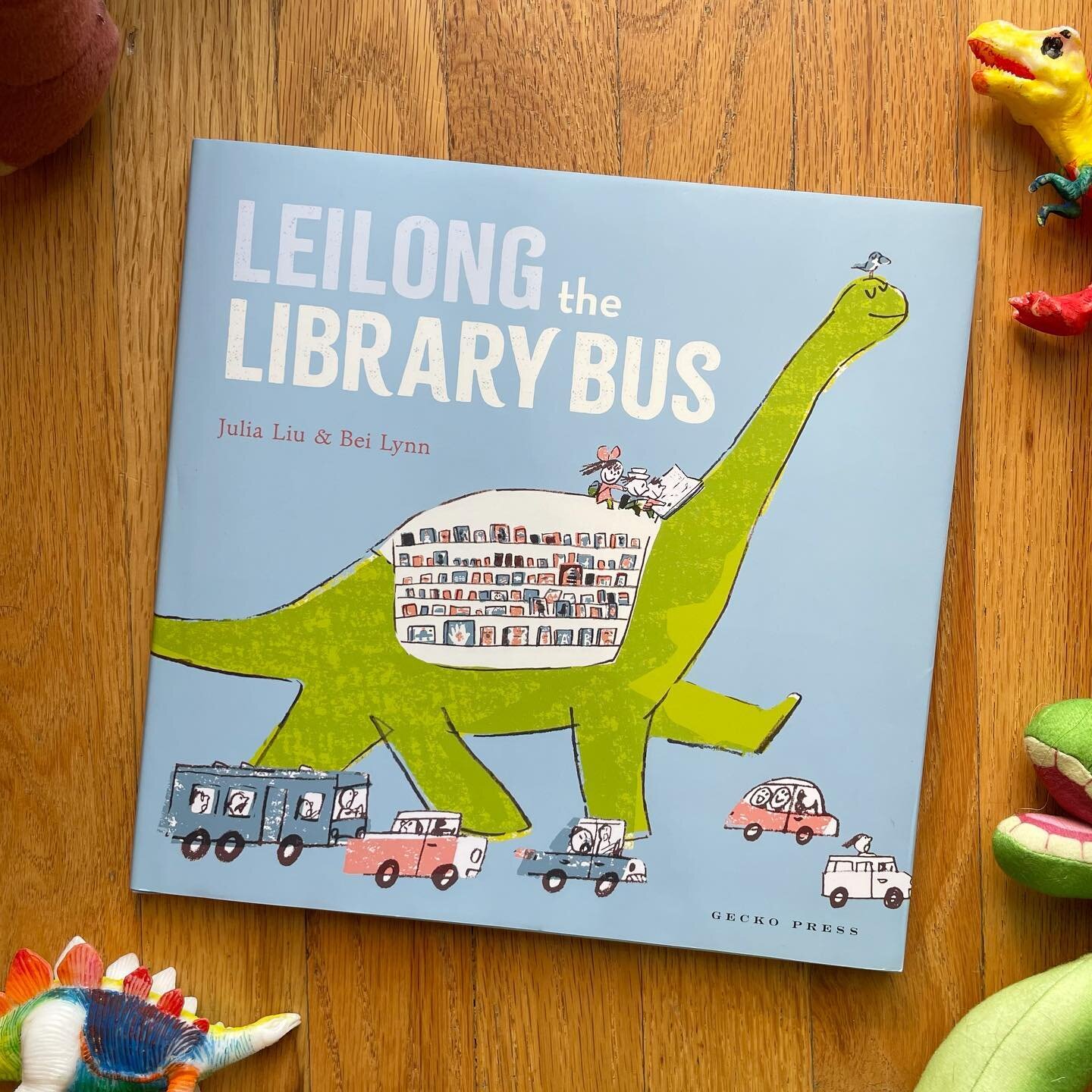 Raise your hands if your kid has gone through a dinosaur phase...lauren's littlest is currently in the midst of one, and LEILONG THE LIBRARY BUS is one of our current favorite books!

Leilong is a book loving dinosaur who yearns to know more about di