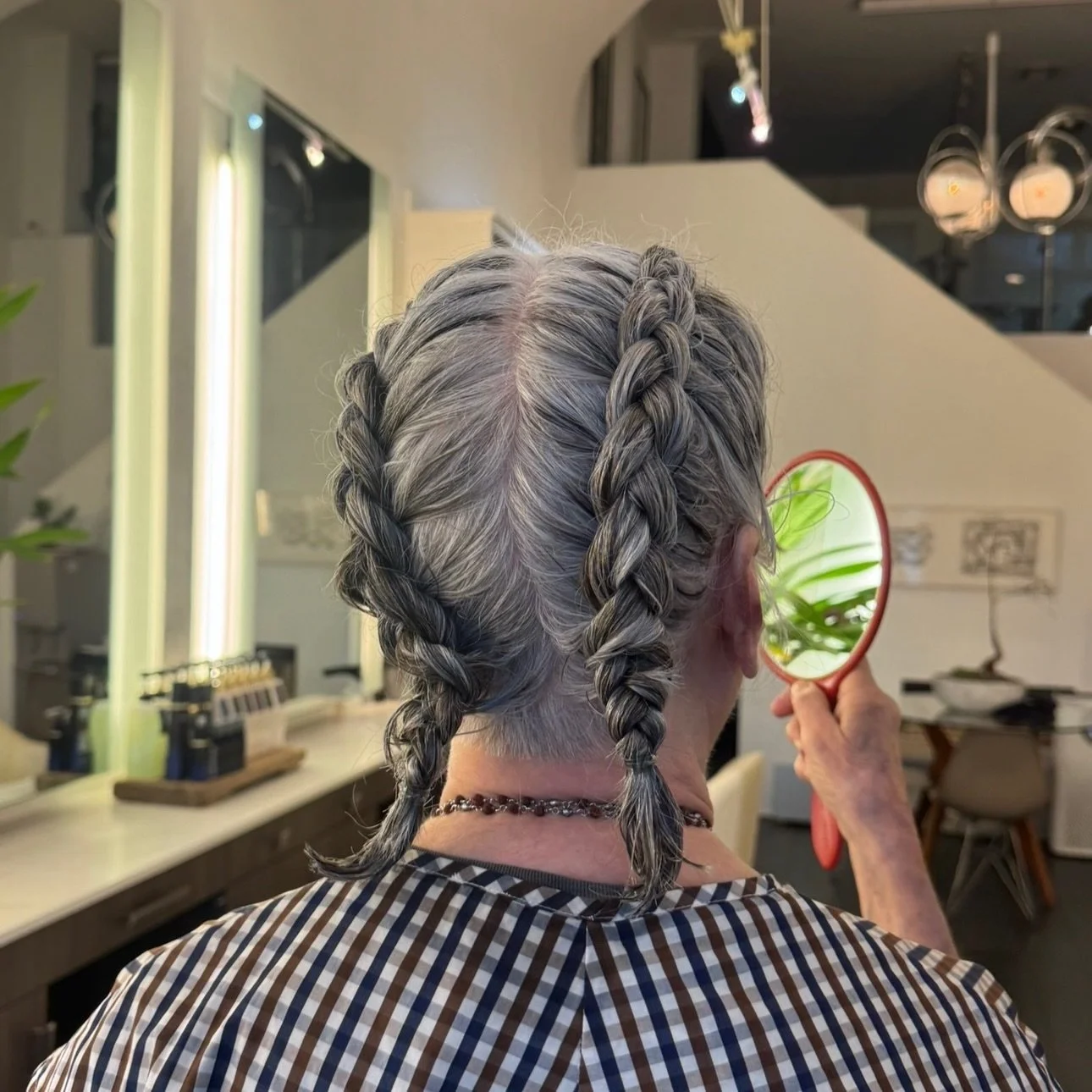 A timeless braided updo, proof that beautiful hair has no age. Classic technique, soft texture, and silver strands woven with care. ✨

Updo &amp; braid styling services available.

#salon #hairstyles #braidstyle #hairstylist #haircolor