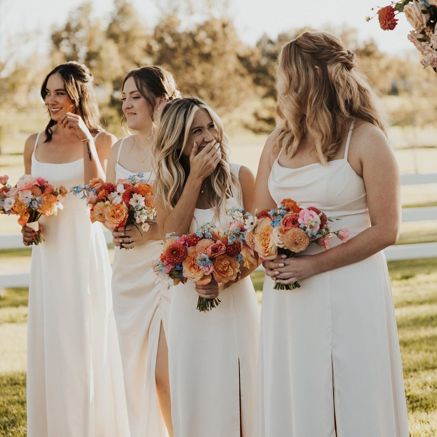 Holding more than just flowers on your wedding day; clutching years of laughter, tears, and memories that bloom as bright as the bouquet that you hold. 

@sunnieheers 
@thebarnatraccooncreek