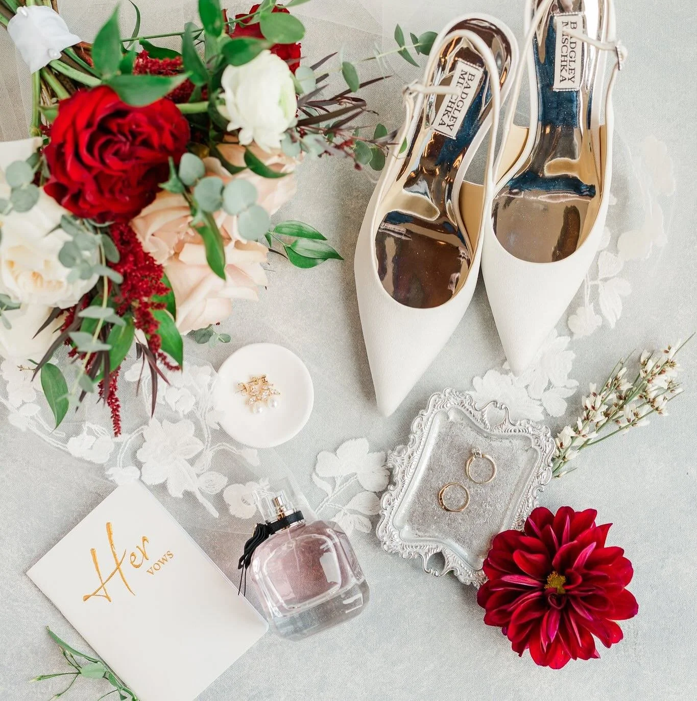 In the intricate lace of a bridal veil and the delicate petals of this winter bouquet, beauty truly lies in the details. These details, often overlooked, are what weave the magic of the day into every photo. Never underestimate the power of the littl