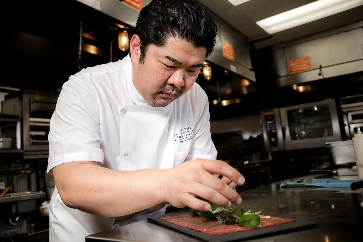 When the going gets tough, the Iron Chef creates meal kits for home cooks complete with video tutorials