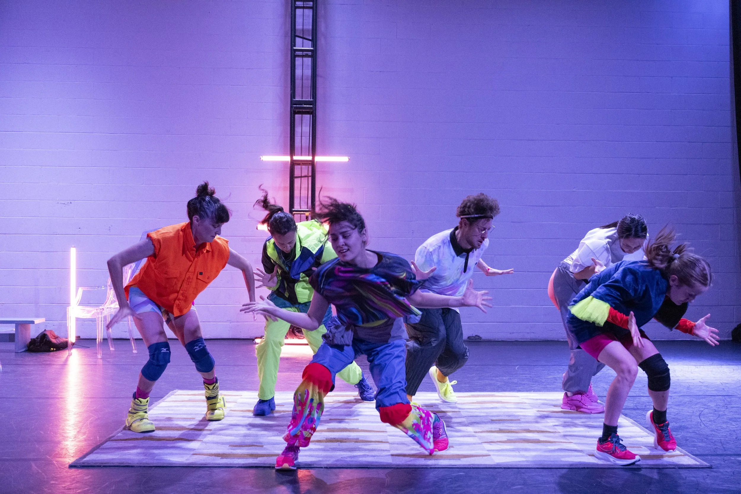 Dance review: Bathed in lossy's neon glow, Company 605 dances the infinite scroll