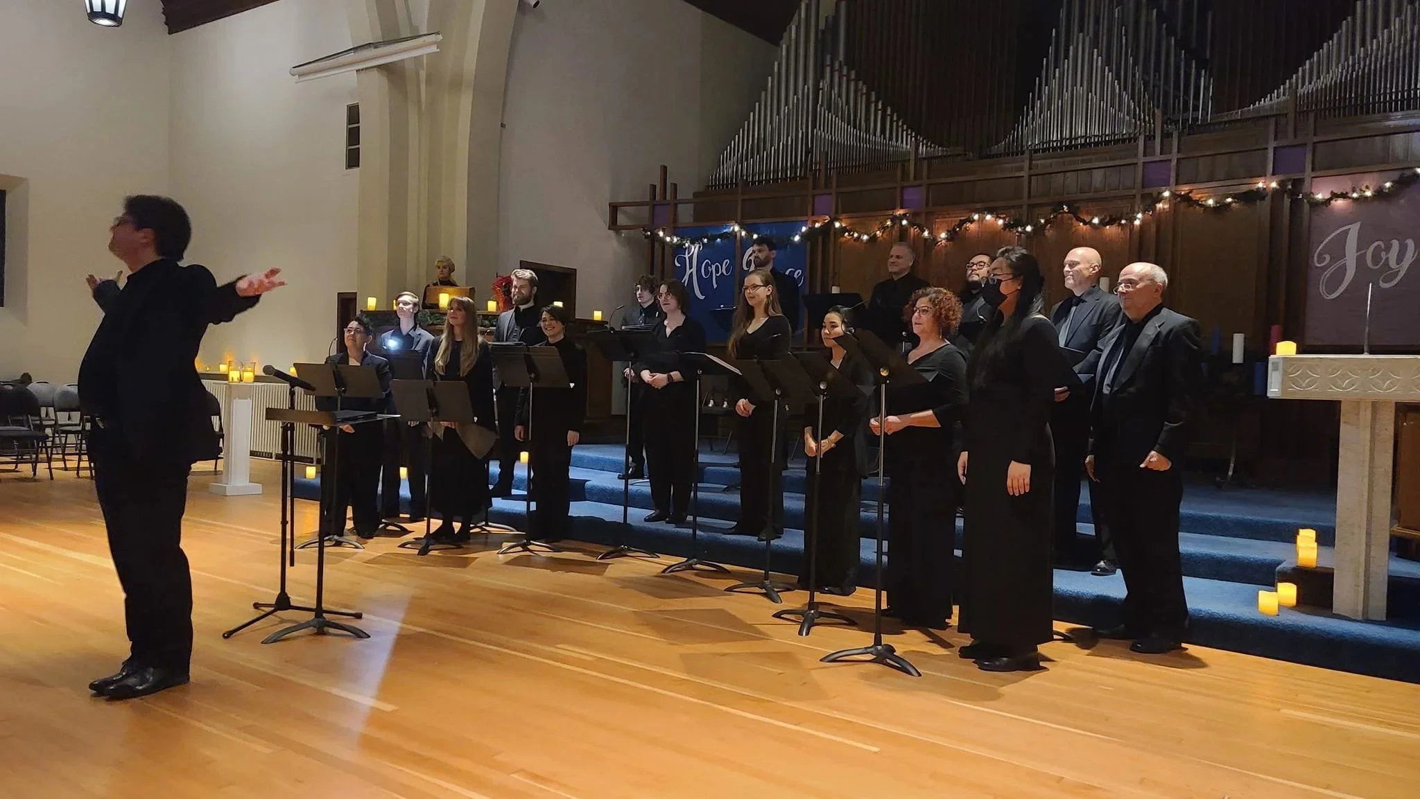 Vancouver Chamber Choir sings in a softly glowing church at Christmas by Candlelight, December 19