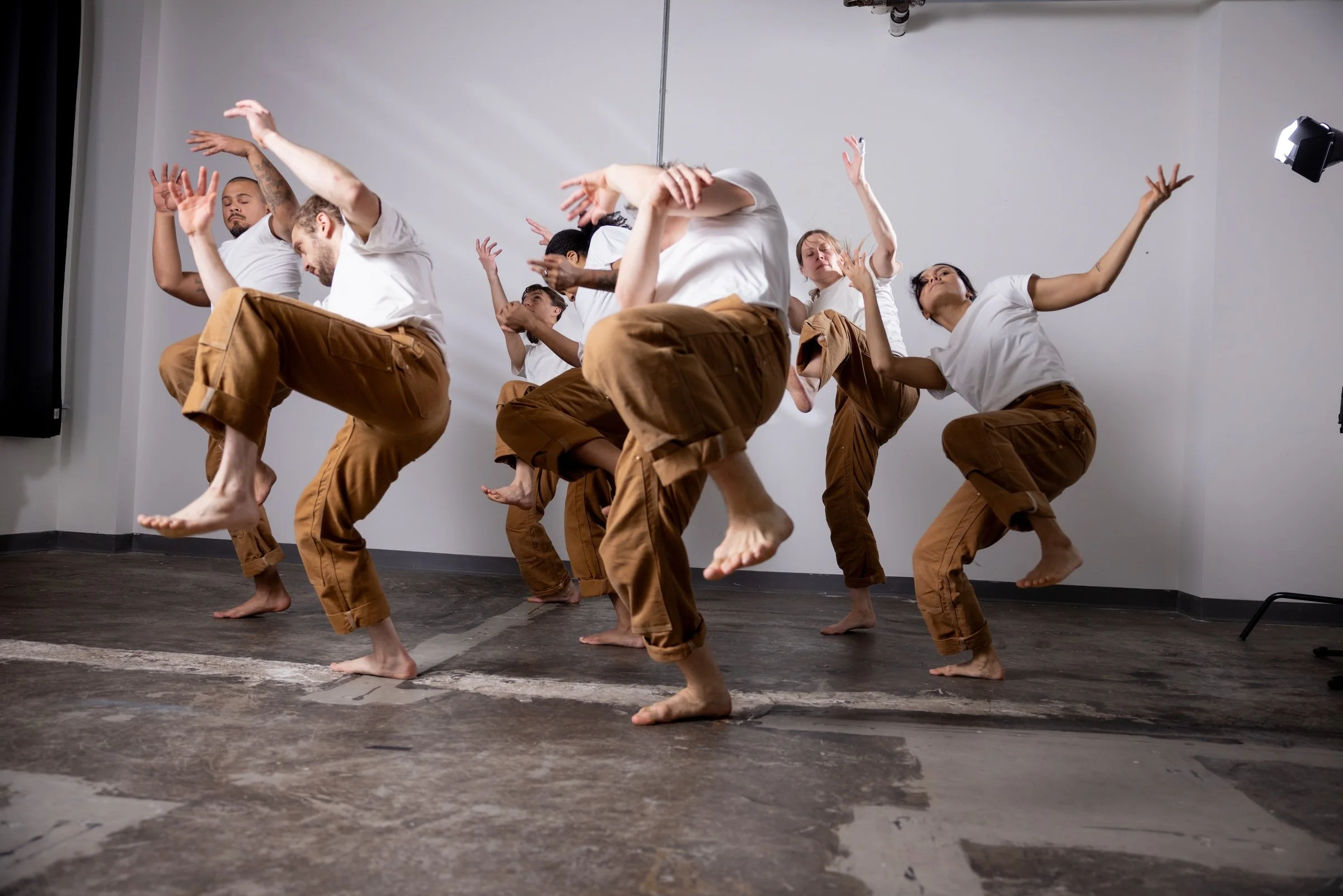 In Fall(se) Circ(us), dancers embrace cycles of frenzied work and relatable exhaustion