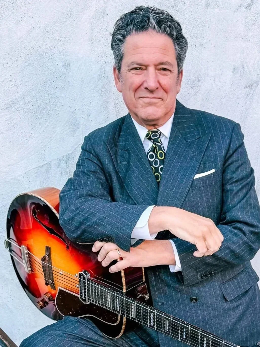 Singer-guitarist John Pizzarelli continues the storied tradition of Italian-American jazz. 

The New York artist draws on everything from the guitar work of legends like Joe Pass and his own father to the unmistakable voice of Tony Bennett&mdash;the 