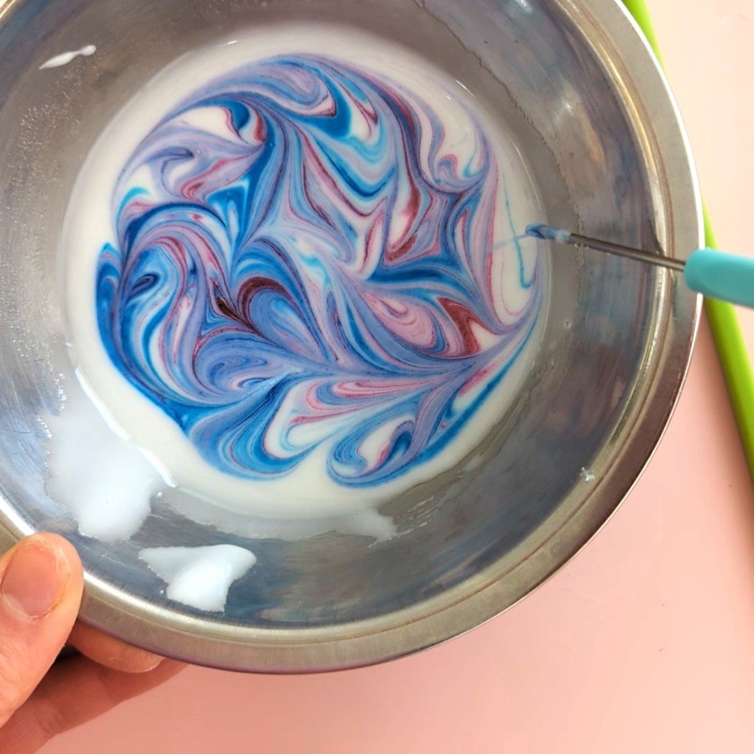 swirling colours for dipped easter egg sugar cookies.jpg