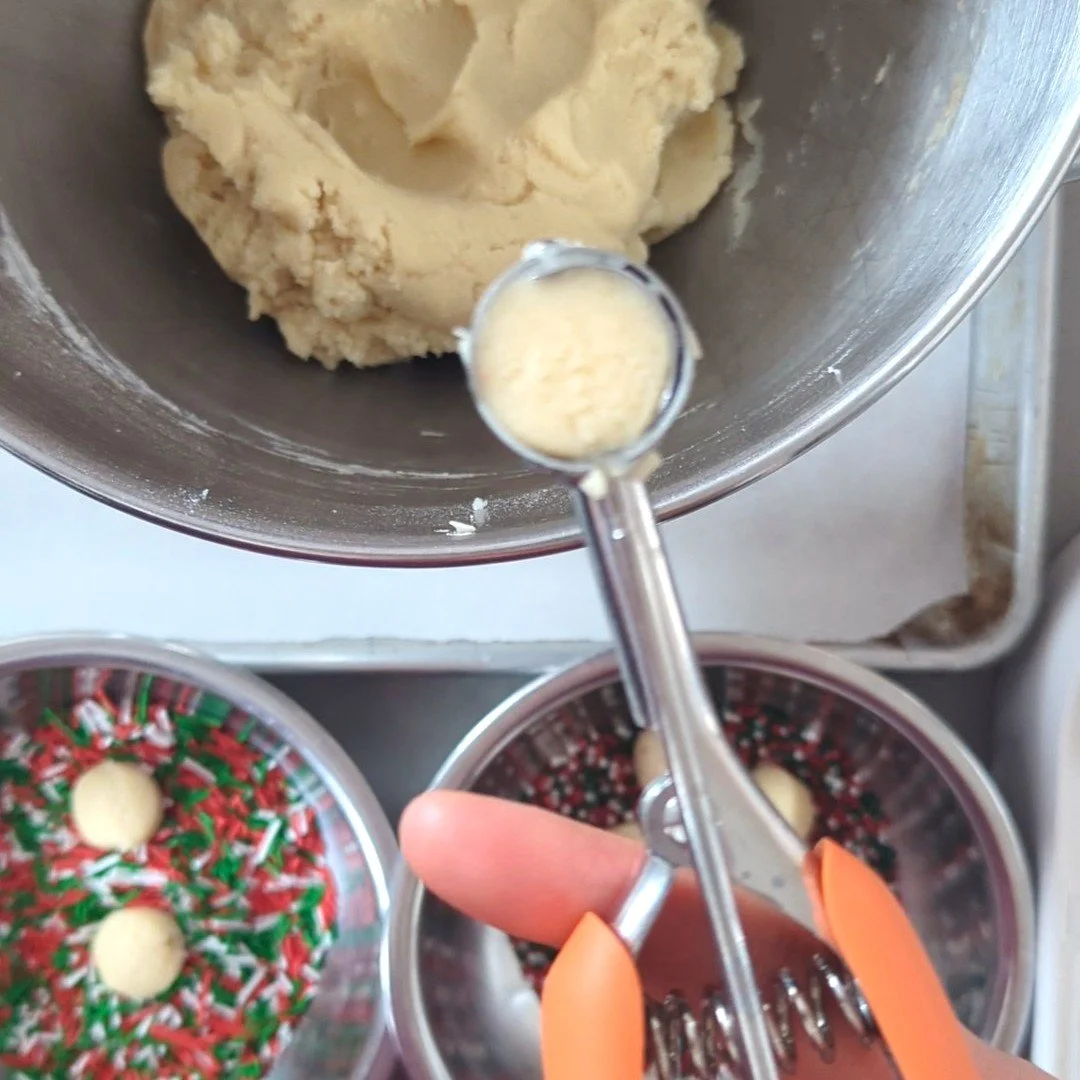 scooping mini sprinkle cookies.jpg