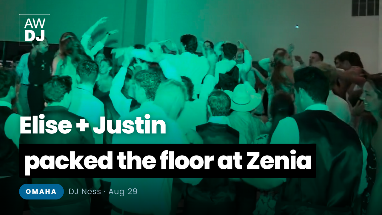 Wedding guests packing the dance floor at Zenia in Omaha, Nebraska, with DJ Ness on the decks