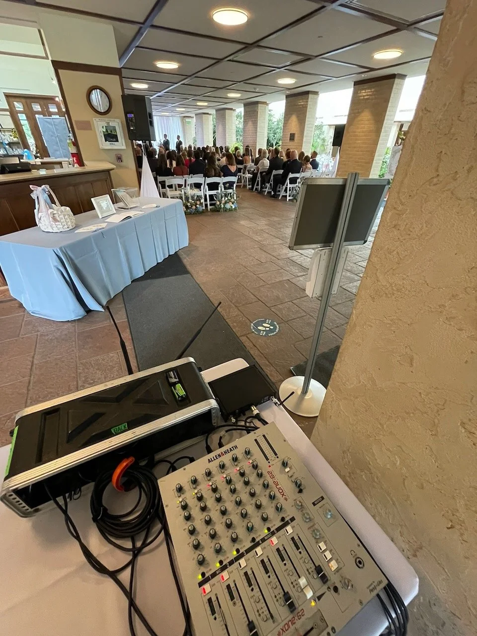 DJ sound setup for an indoor wedding ceremony at Lauritzen Gardens in Omaha
